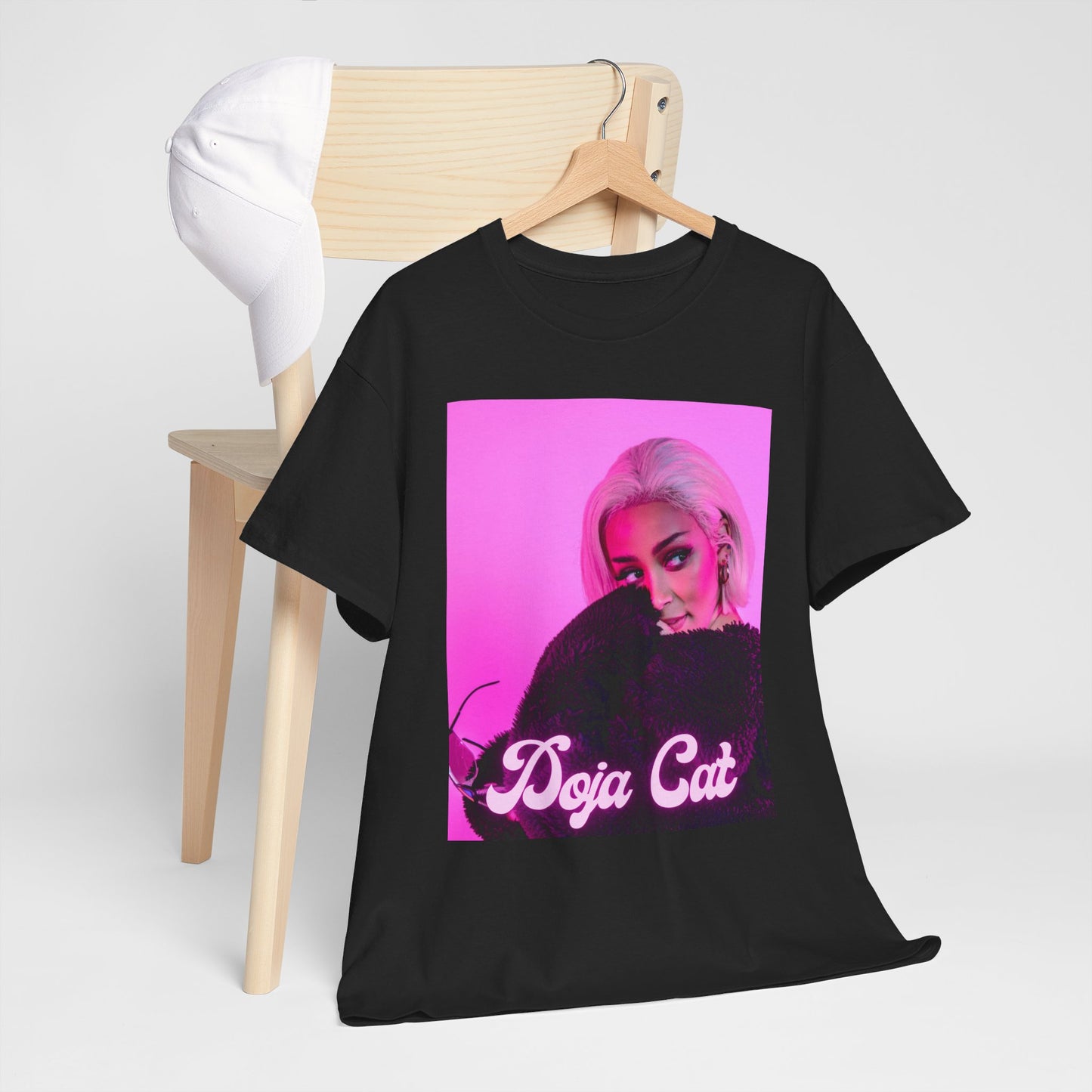 A black graphic t-shirt featuring a classic graphic related to Doja Cat's 'Planet Her' album.