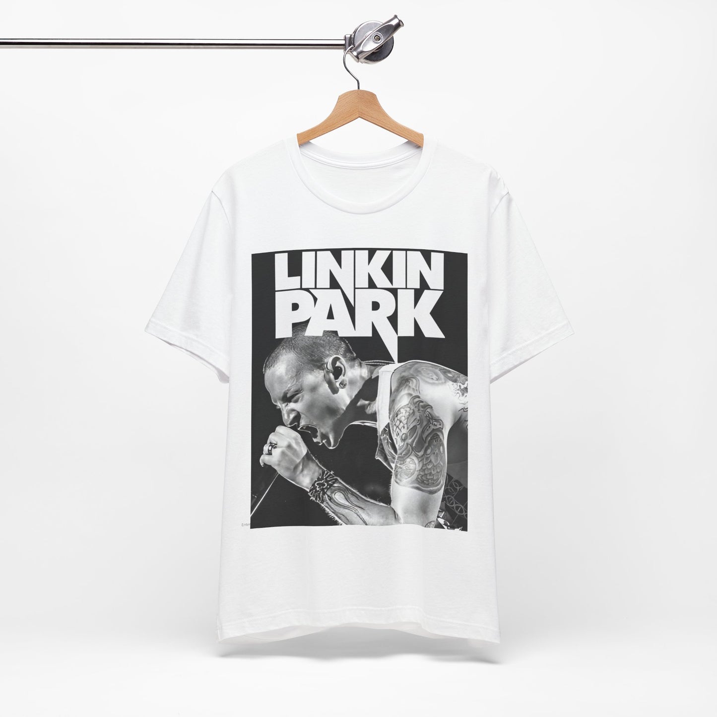 A black graphic t-shirt featuring a black and white graphic or photo portrait of Chester Bennington from Linkin Park.