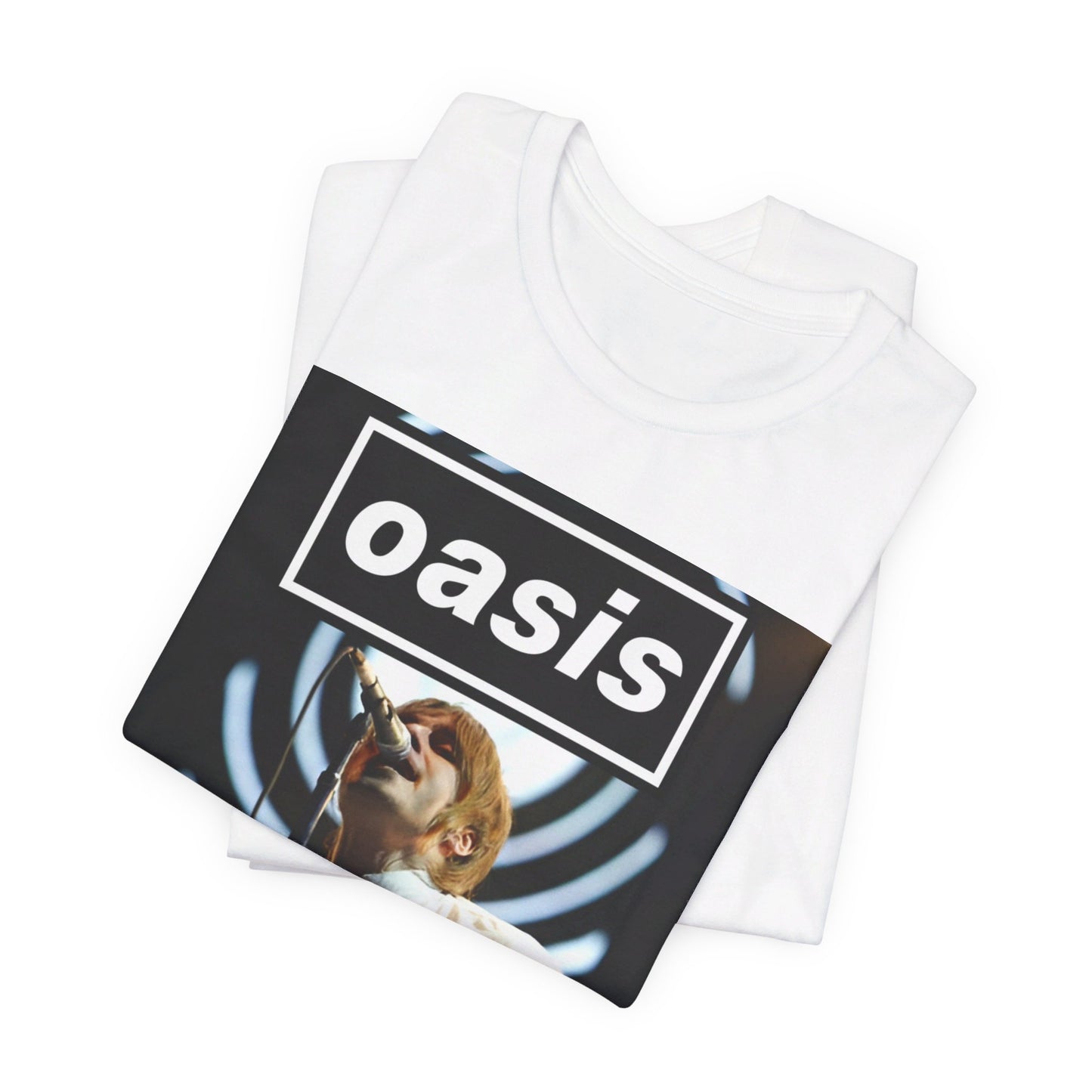 A black graphic t-shirt featuring a graphic or photo of Oasis performing live.