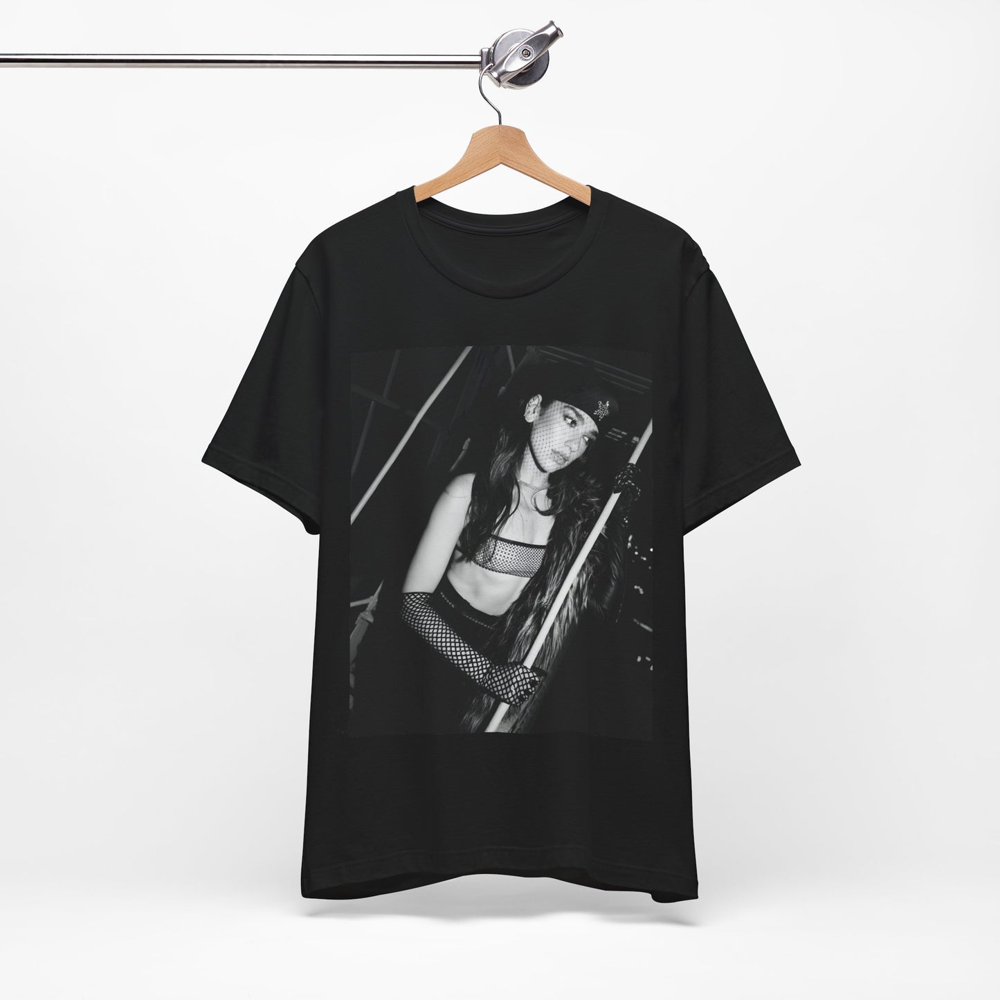 A black graphic t-shirt featuring a black and white, monochrome graphic or portrait of Dua Lipa.