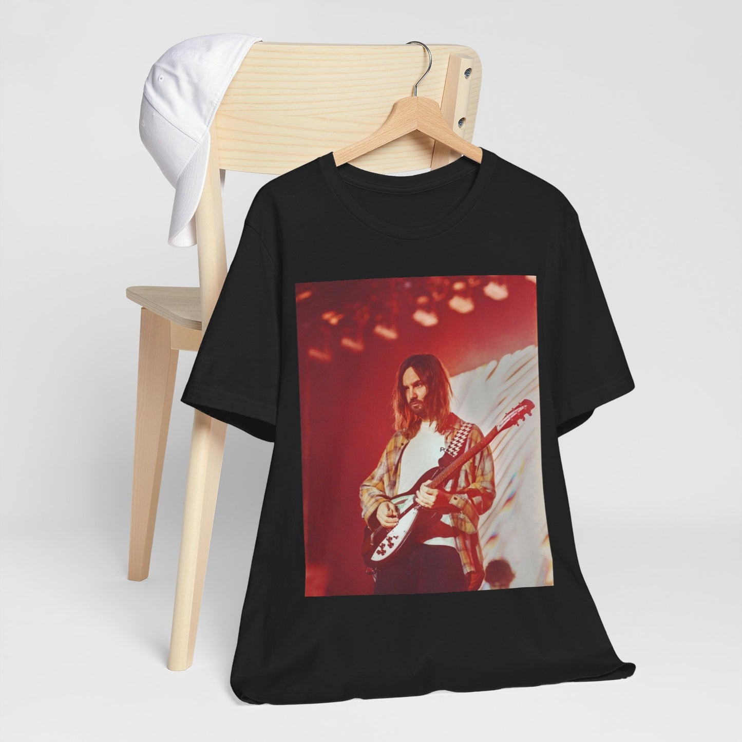 A black graphic t-shirt featuring a cool psychedelic journey graphic of Tame Impala.