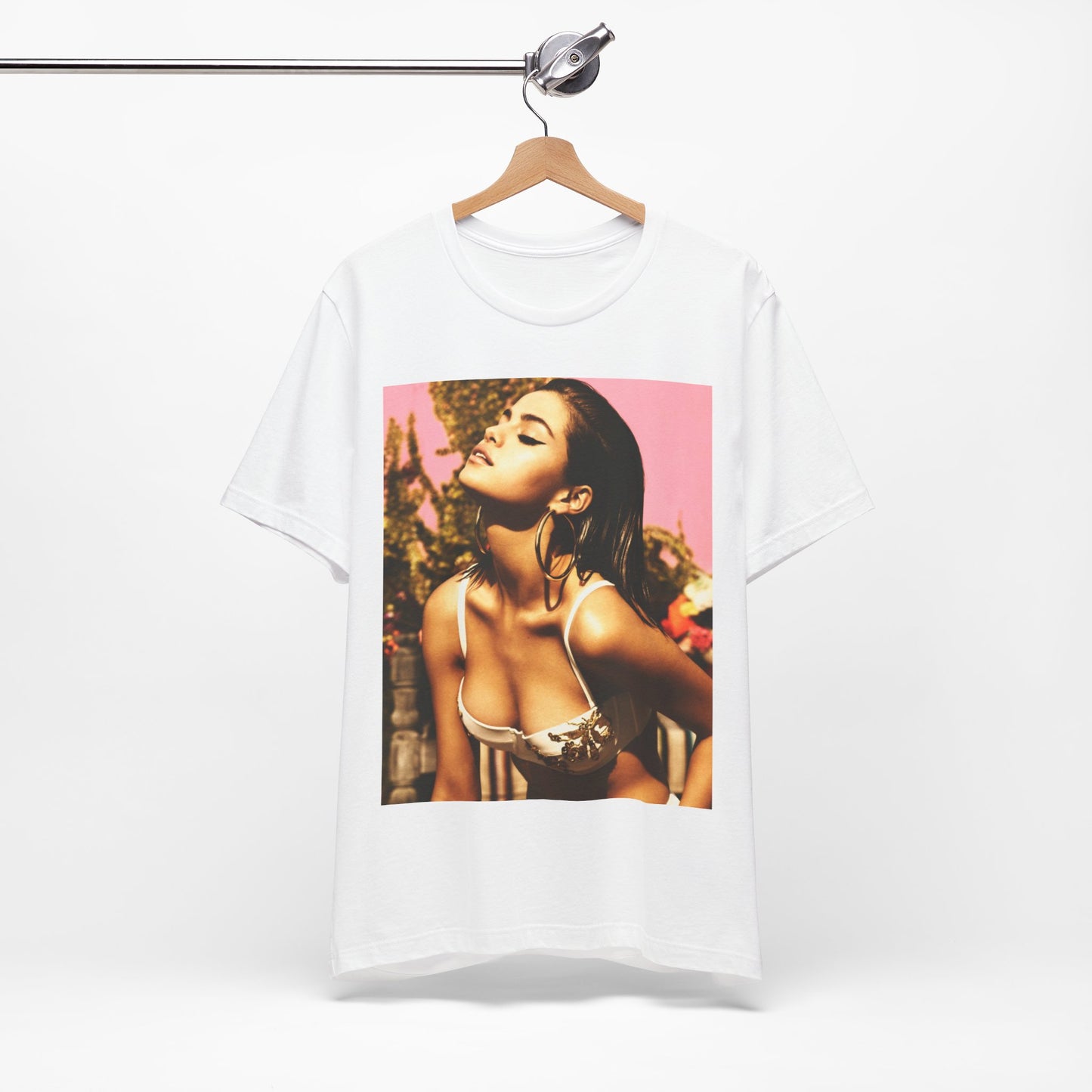 A black graphic t-shirt featuring a graphic of Selena Gomez emphasizing her timeless beauty.