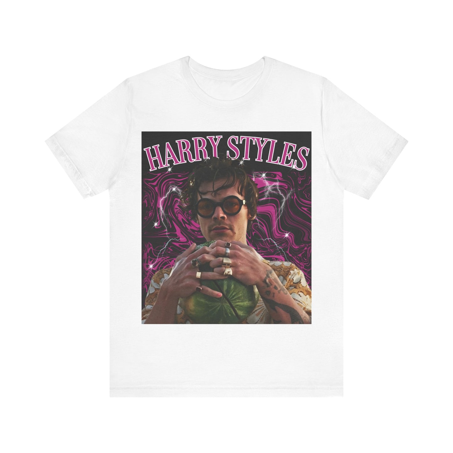 A black graphic t-shirt featuring a bootleg-style pop graphic of Harry Styles.
