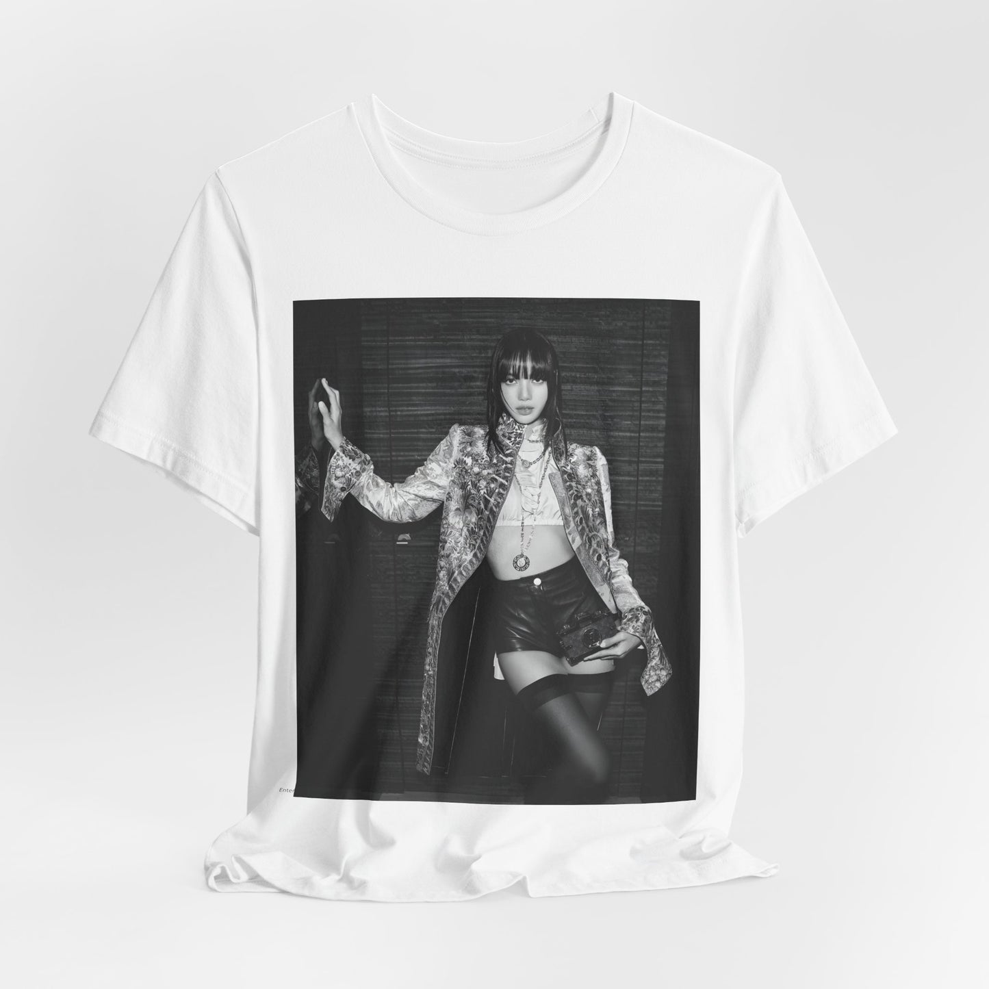 A black graphic t-shirt featuring a black and white, monochrome graphic or photo of Lisa.