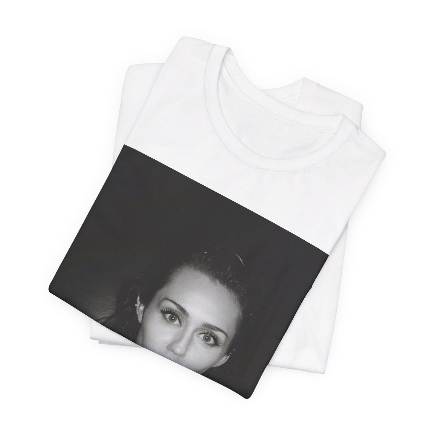 A black graphic t-shirt featuring a graphic related to Miley Cyrus' 'Flowers' song or era.