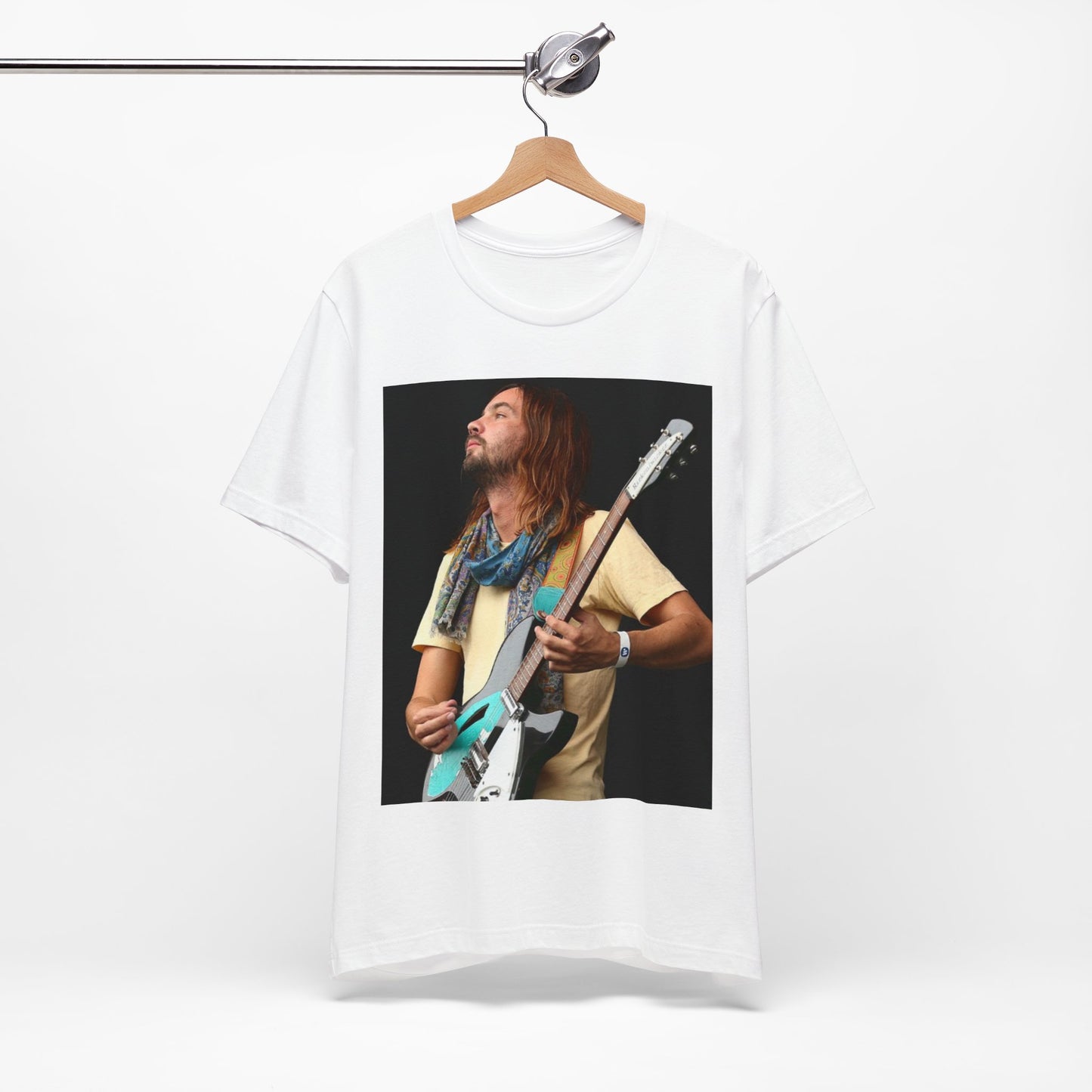 A black graphic t-shirt featuring a vintage indie rock graphic of Tame Impala.