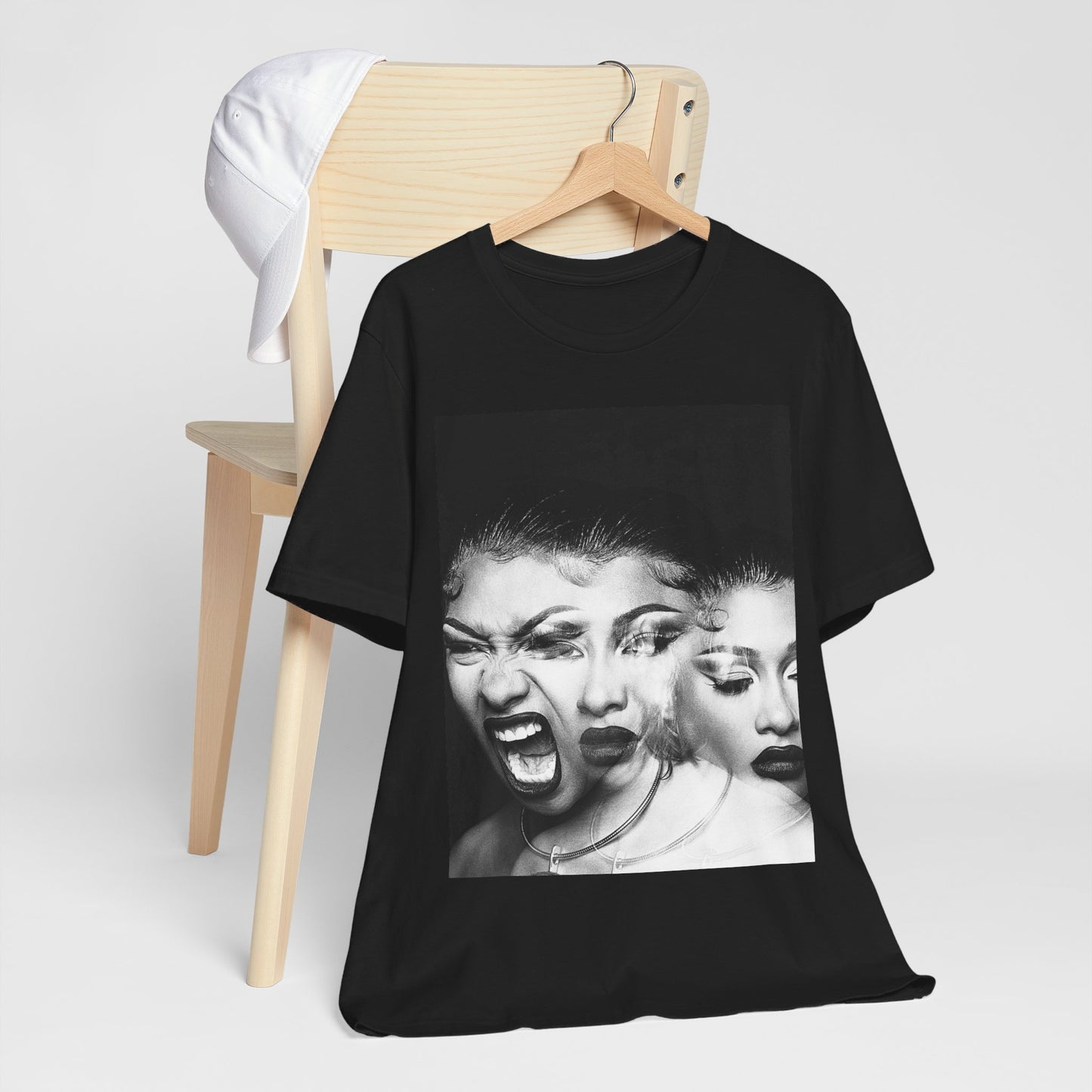 A black graphic t-shirt featuring a graphic related to Megan Thee Stallion's 'Traumazine' album.