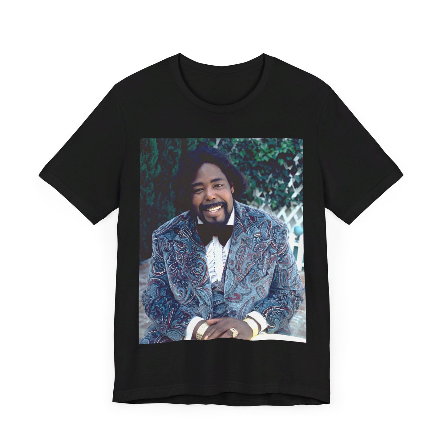 A black graphic t-shirt featuring a retro 70s photo of Barry White, evoking the disco era.