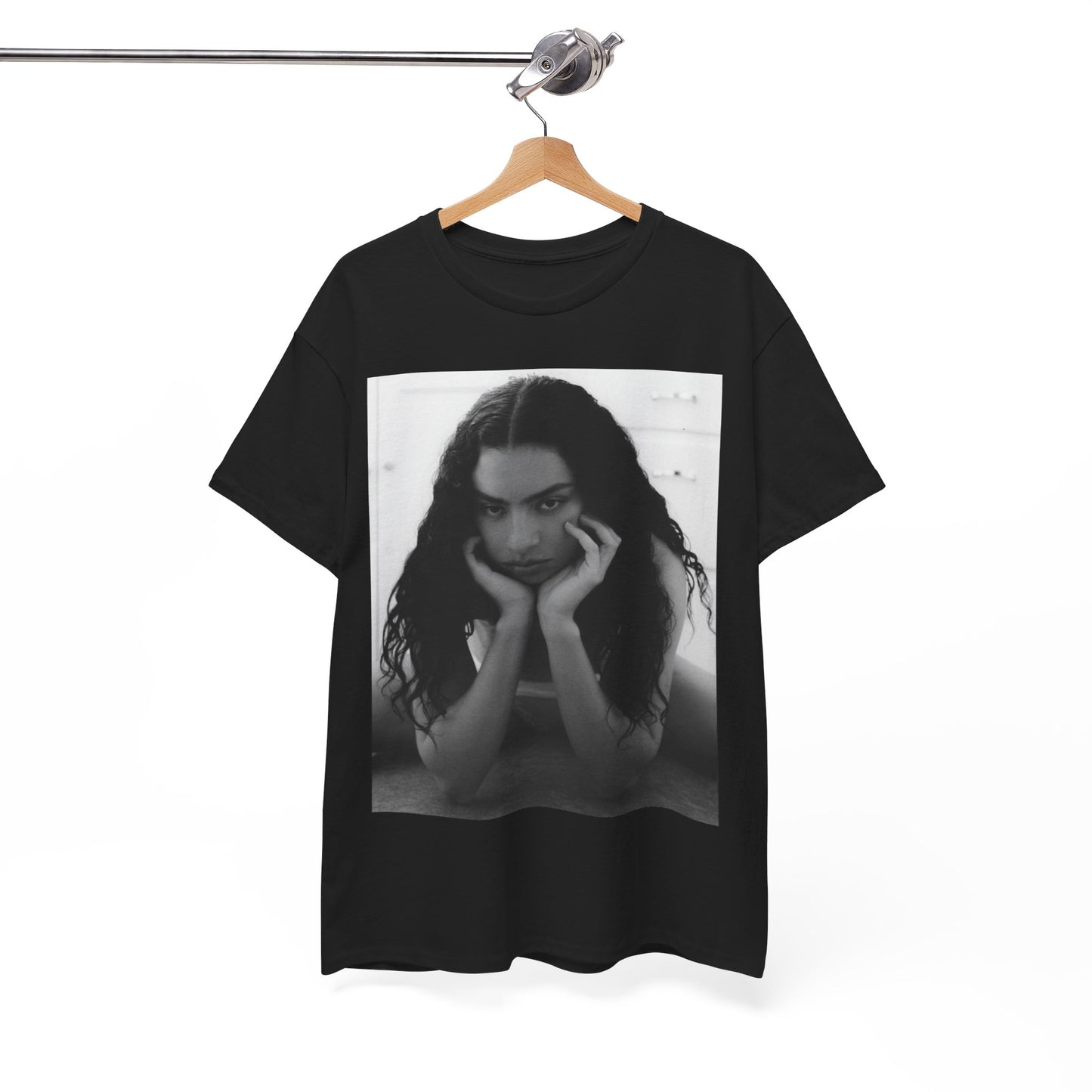 A black graphic t-shirt featuring a black and white, monochrome graphic or photo of Charli XCX.