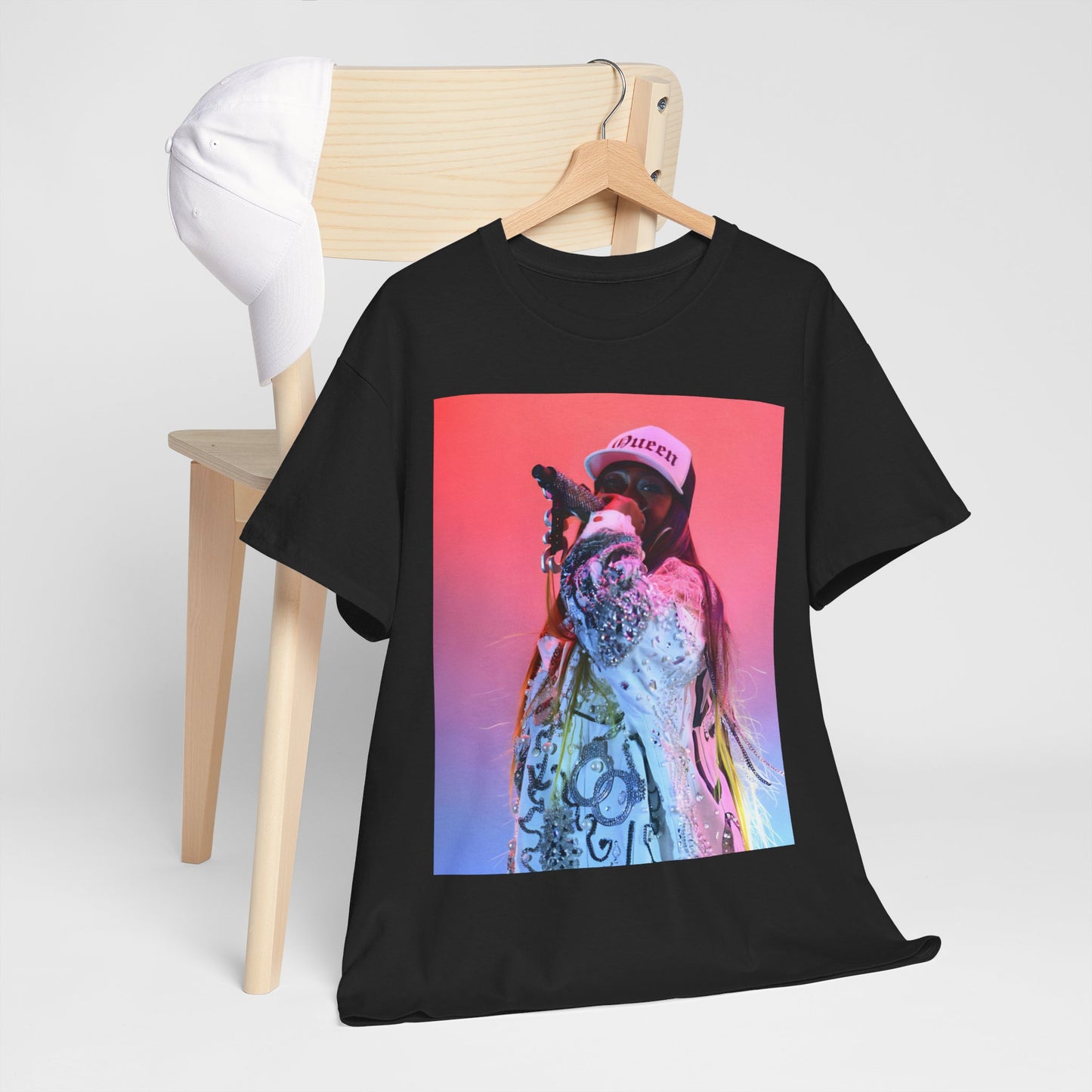 A black graphic t-shirt featuring a graphic of Missy Elliott as a fearless performer.