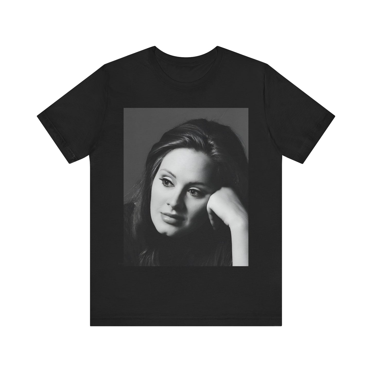 A black graphic t-shirt featuring a vintage-style black and white studio portrait of Adele, showing her with a poised and elegant expression.
