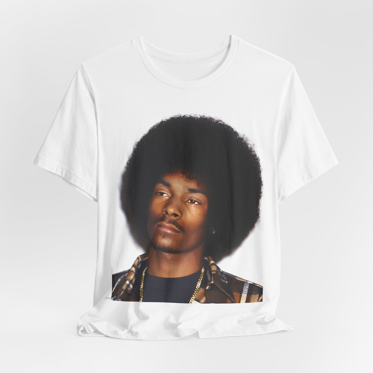 A black graphic t-shirt featuring a 90s vintage hip hop icon graphic of Snoop Dogg.