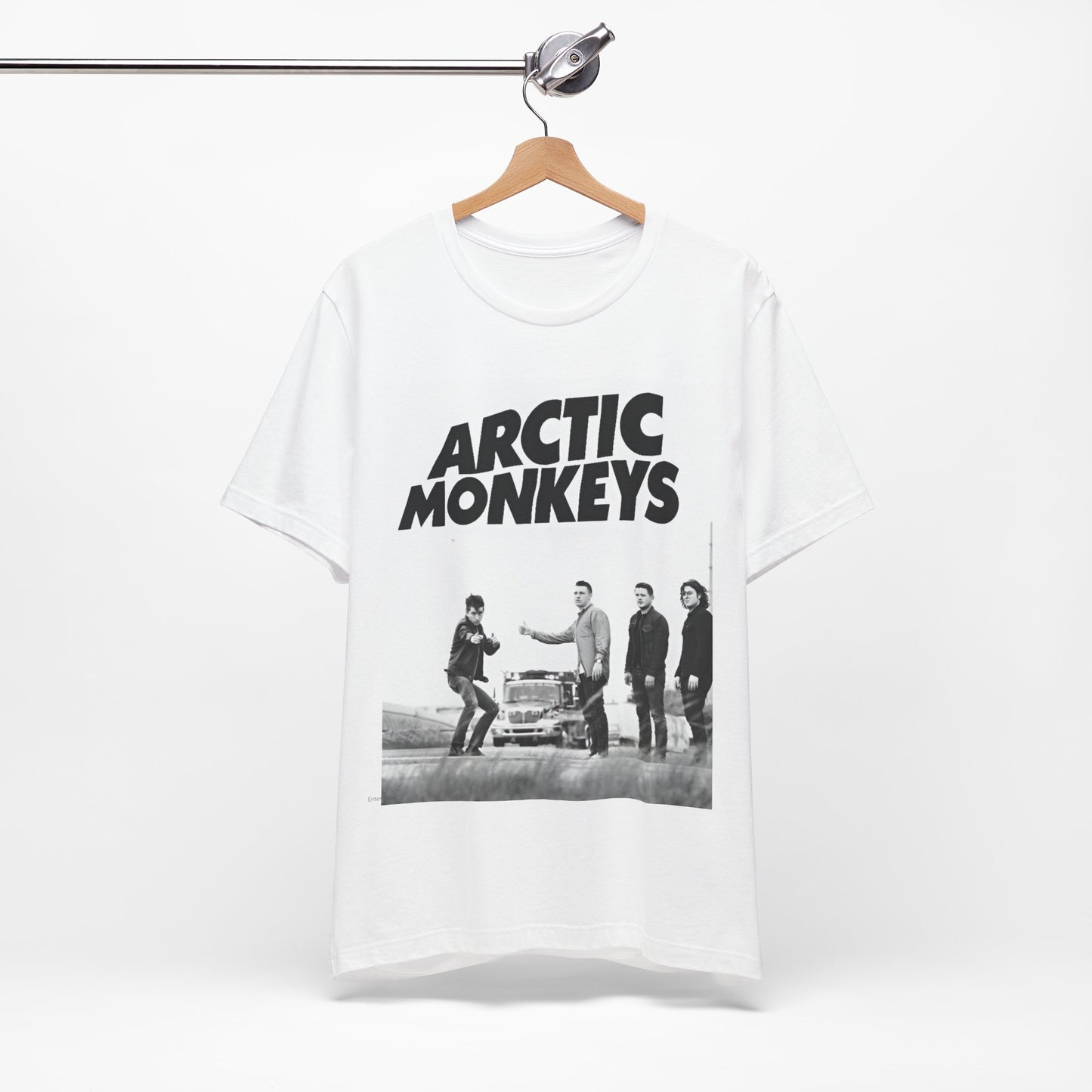 A black graphic t-shirt featuring the Arctic Monkeys logo in black and white.