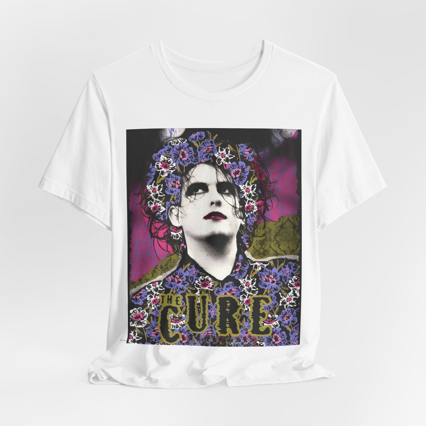 A black graphic t-shirt featuring a retro rock aesthetic pop art graphic of The Cure.