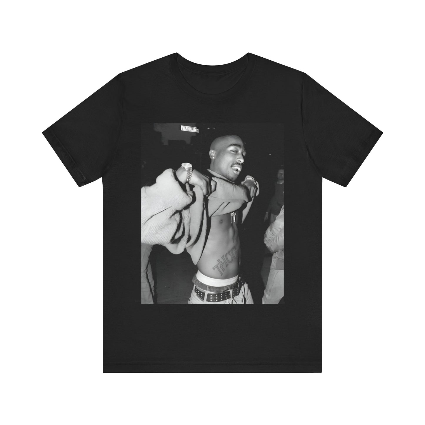 A black graphic t-shirt featuring a vintage hip hop icon graphic of Tupac.