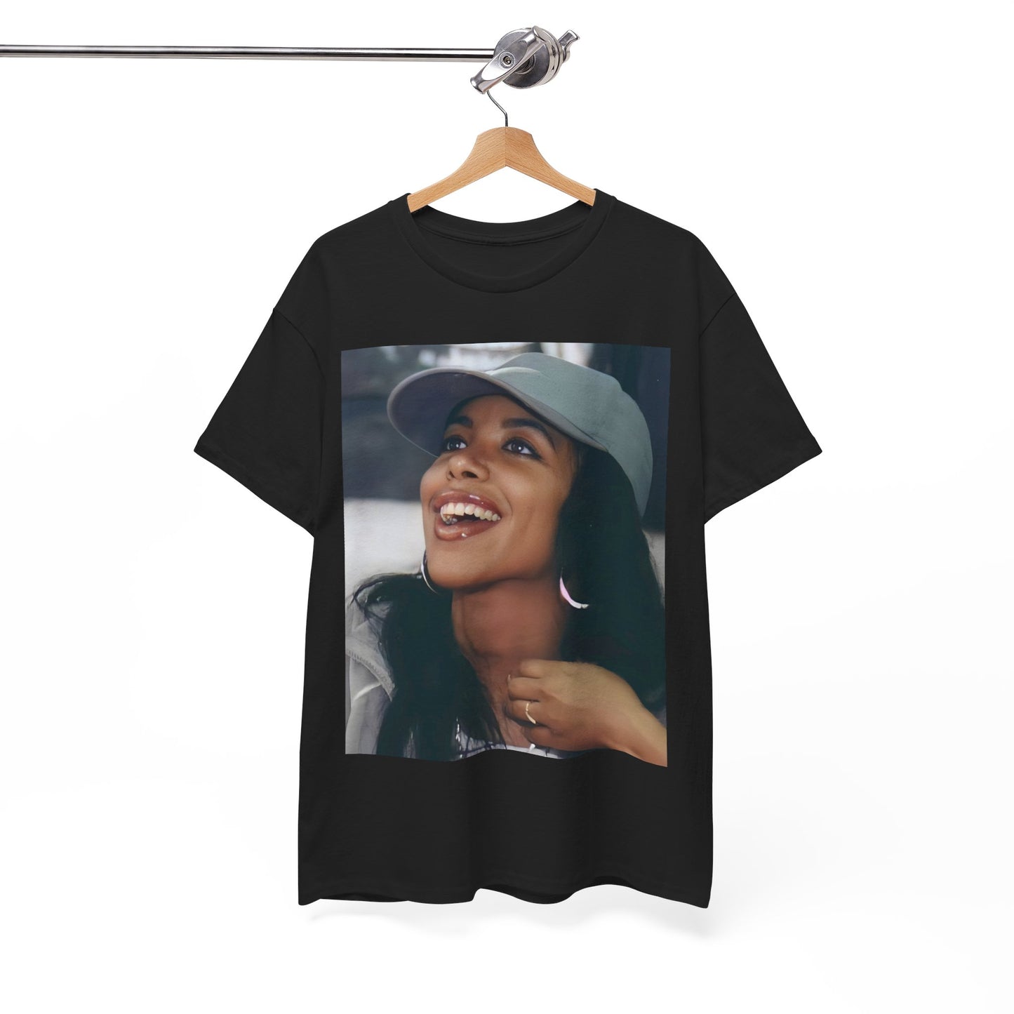 A black graphic t-shirt featuring a vintage street style icon graphic of Aaliyah.
