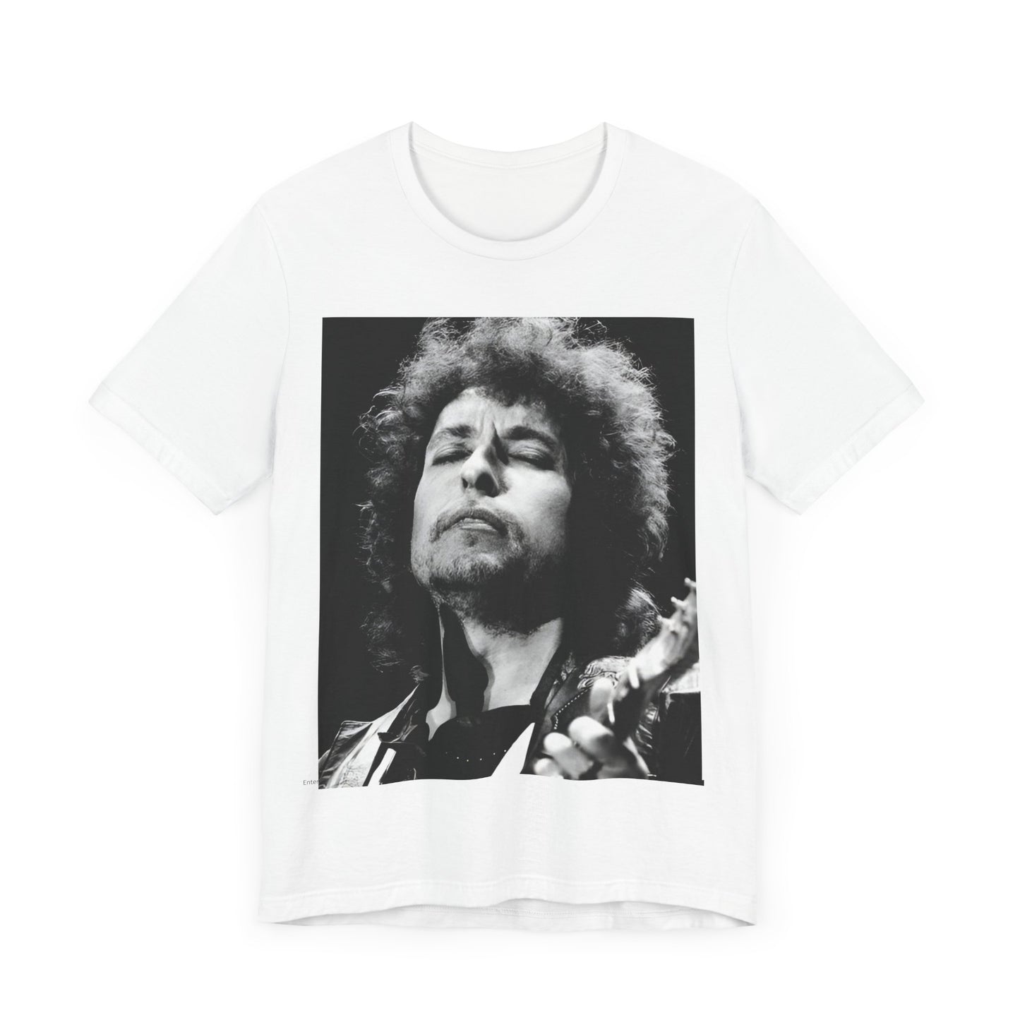 A black graphic t-shirt featuring a retro black and white graphic or photo of Bob Dylan performing live.