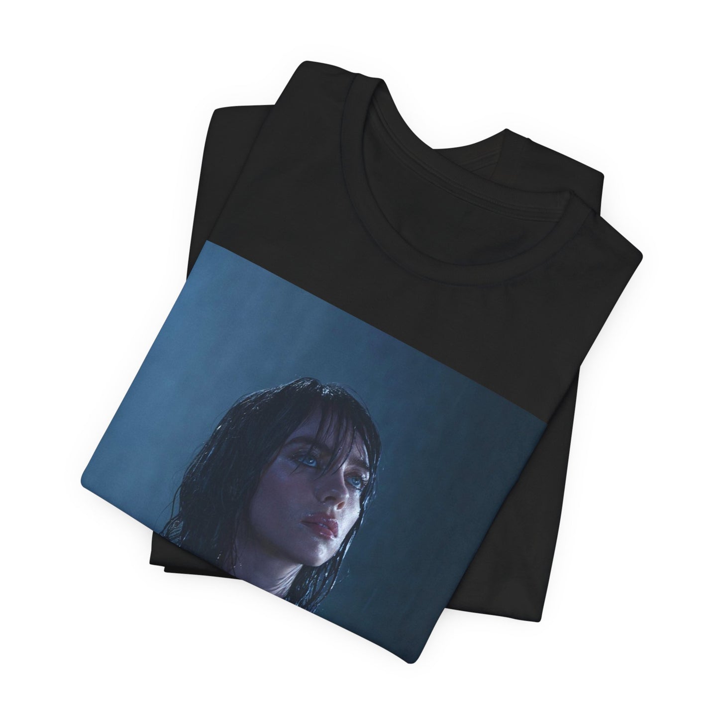 A direct, powerful portrait of Billie Eilish, embodying the 'HIT ME HARD AND SOFT' album era, printed on a graphic t-shirt.