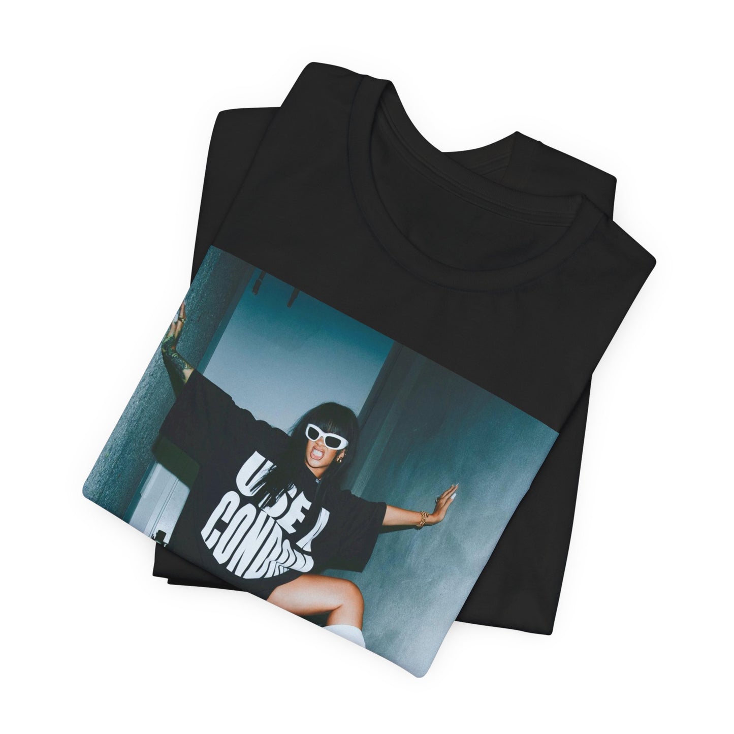 A black graphic t-shirt featuring a modern pop essential graphic of Rihanna.