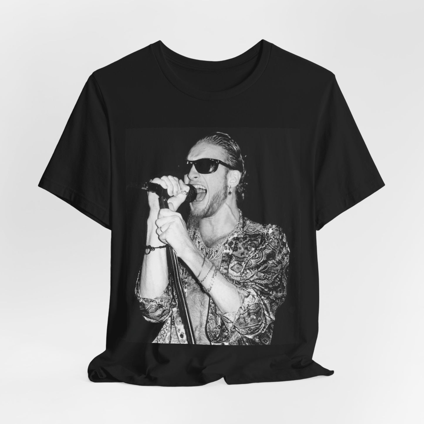A black graphic t-shirt featuring an iconic black and white portrait photo of Layne Staley from Alice In Chains, showing his distinctive look.