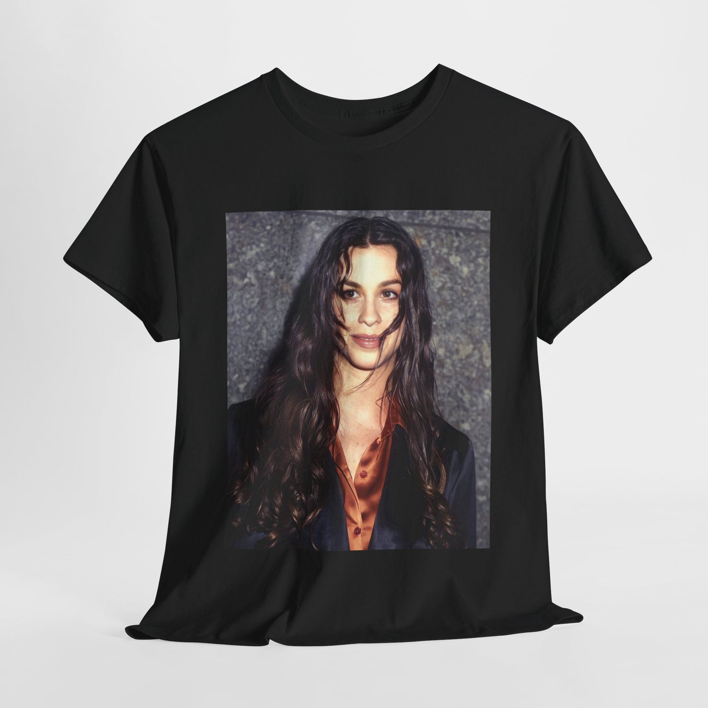 A black graphic t-shirt featuring a classic portrait or graphic of Alanis Morissette.