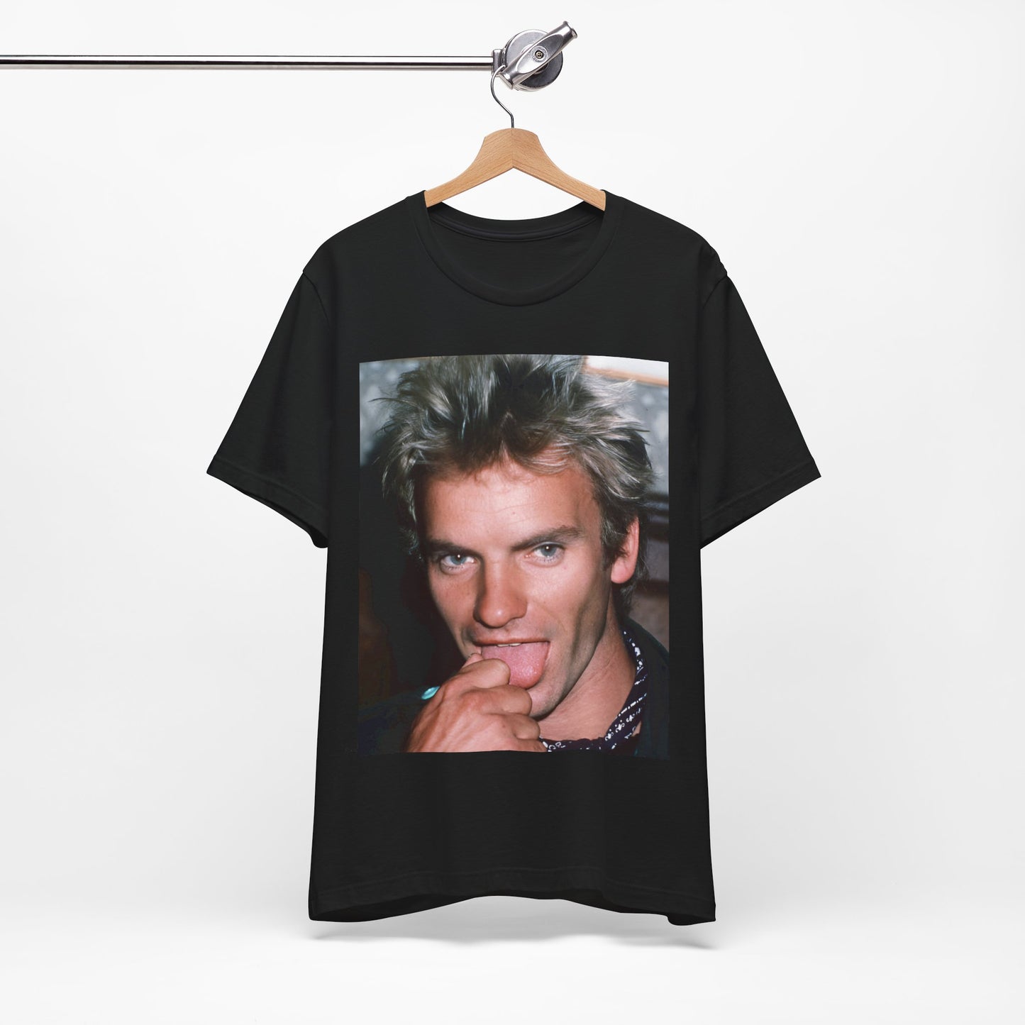 A black graphic t-shirt featuring an 80s new wave aesthetic graphic of Sting.