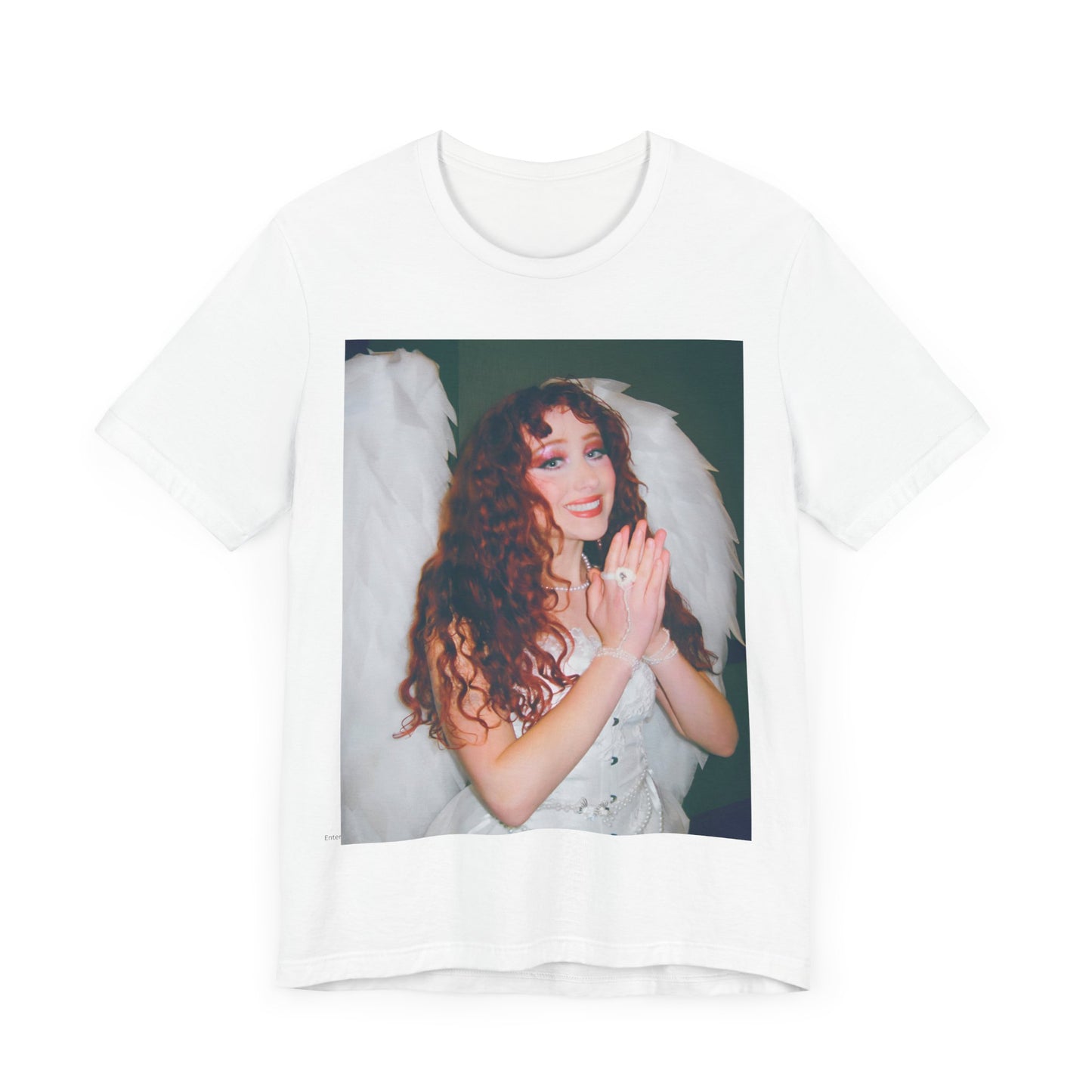 A black graphic t-shirt featuring a graphic of Chappell Roan, possibly with DIY or independent pop elements.
