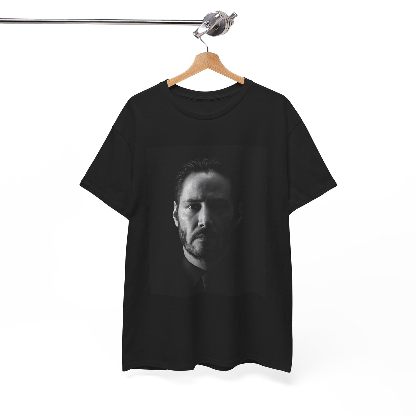 A black graphic t-shirt featuring a graphic of Keanu Reeves as John Wick.