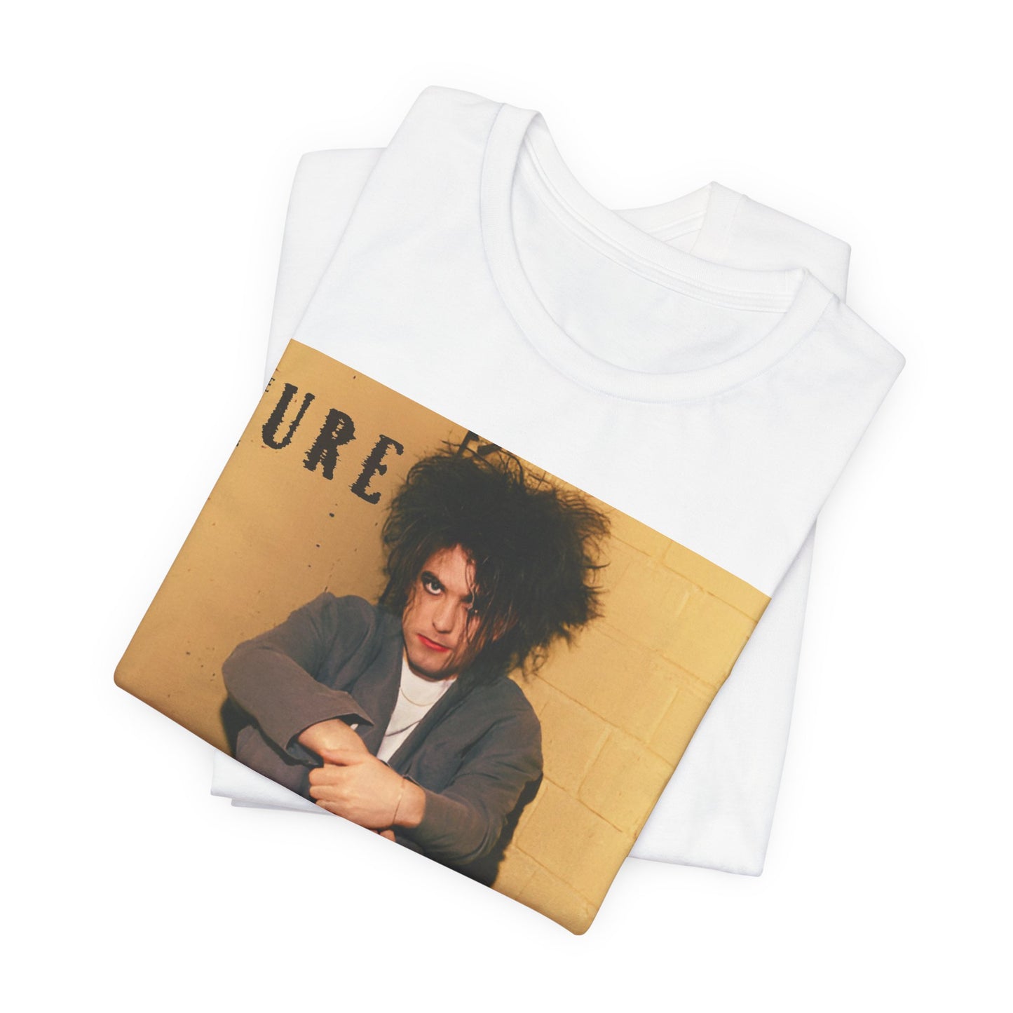 A black graphic t-shirt featuring a bold goth rock superstar graphic of The Cure.