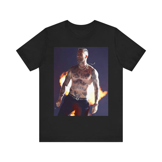 Maroon 5 t-shirt showing Adam Levine performing solo onstage with guitar under spotlight.