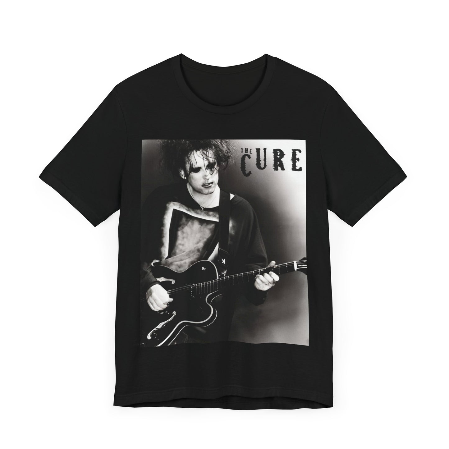 A black graphic t-shirt featuring a vintage goth rock graphic of The Cure.