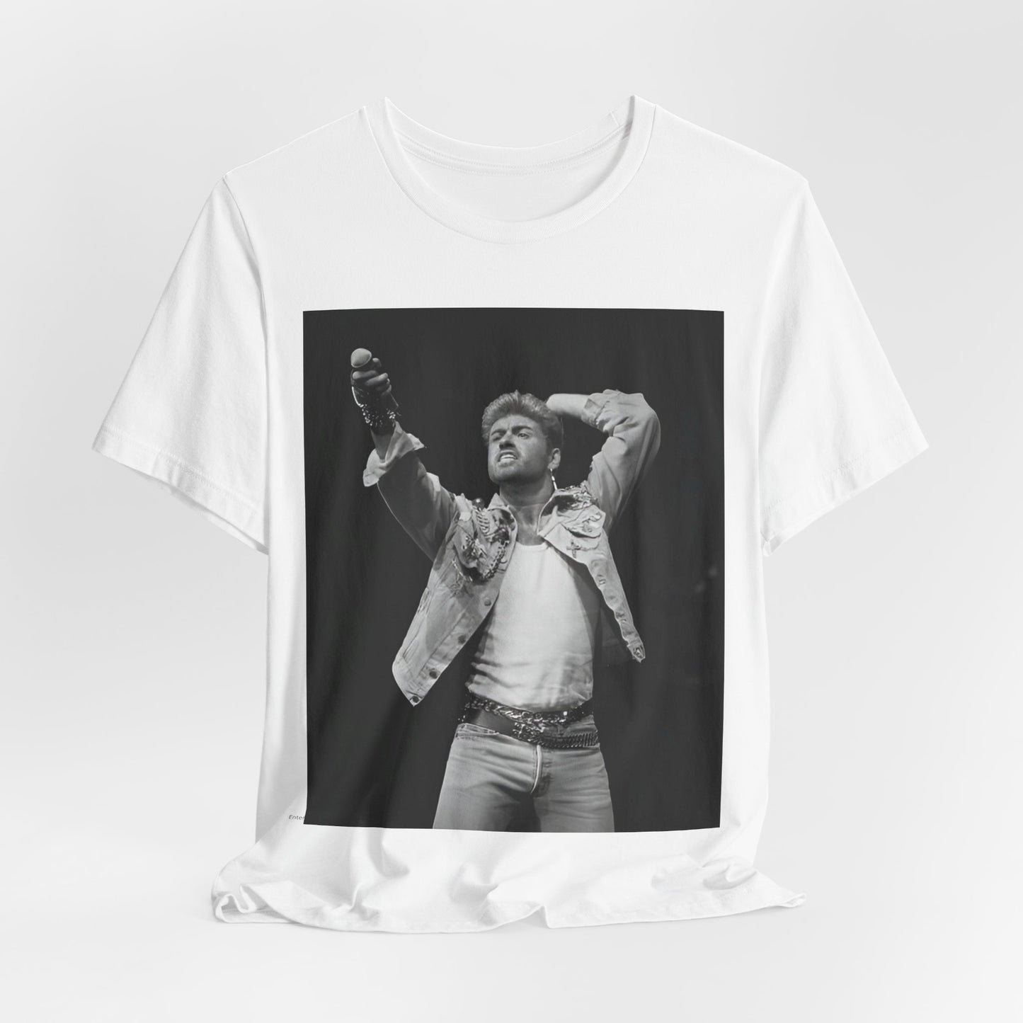 A black graphic t-shirt featuring a graphic or photo of George Michael performing live on stage.