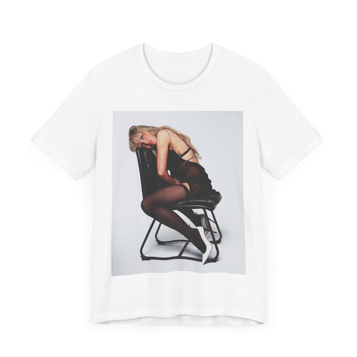 A black graphic t-shirt featuring a playful pop art style graphic of Sabrina Carpenter.