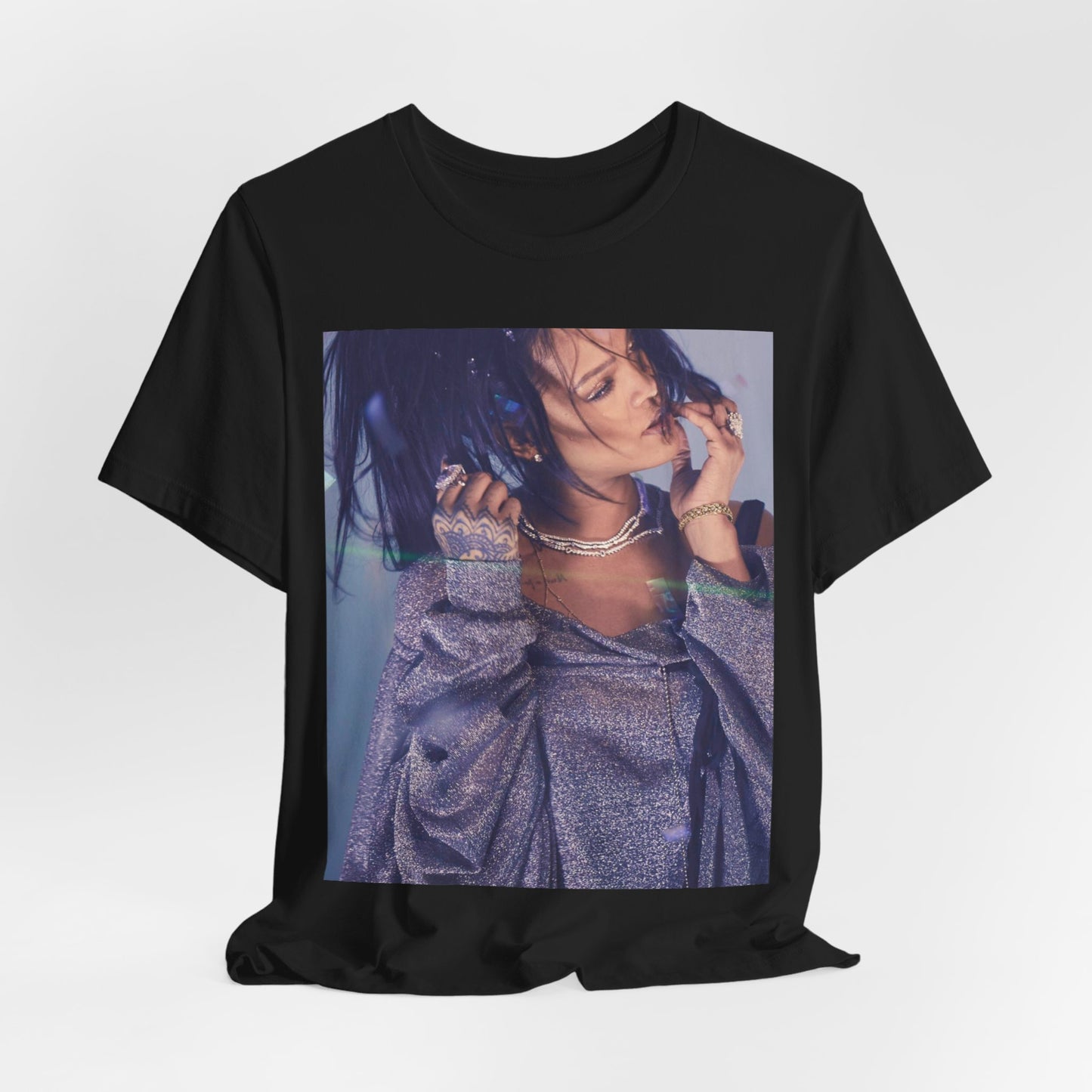 A black graphic t-shirt featuring a graphic related to Rihanna's 'Anti' album era.