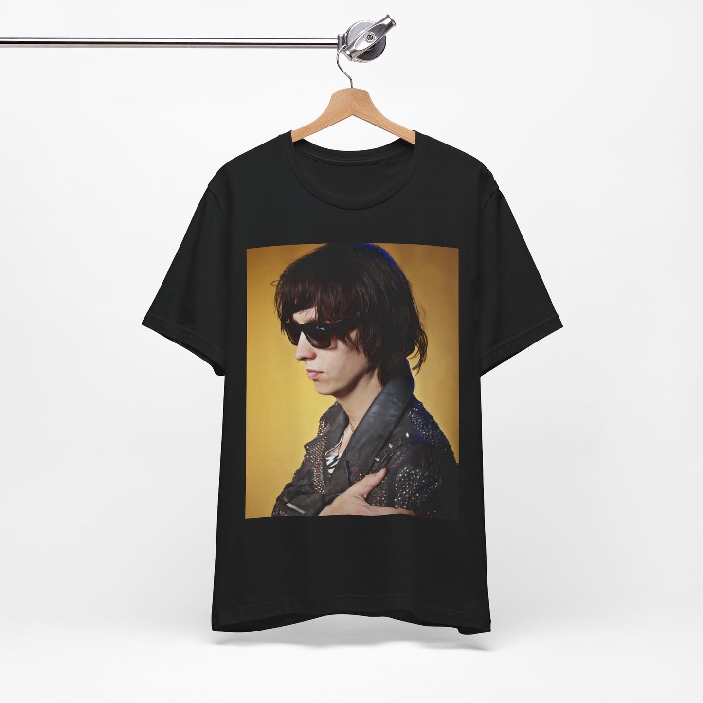 A black graphic t-shirt featuring a retro graphic related to The Strokes' 'Is This It' album era.