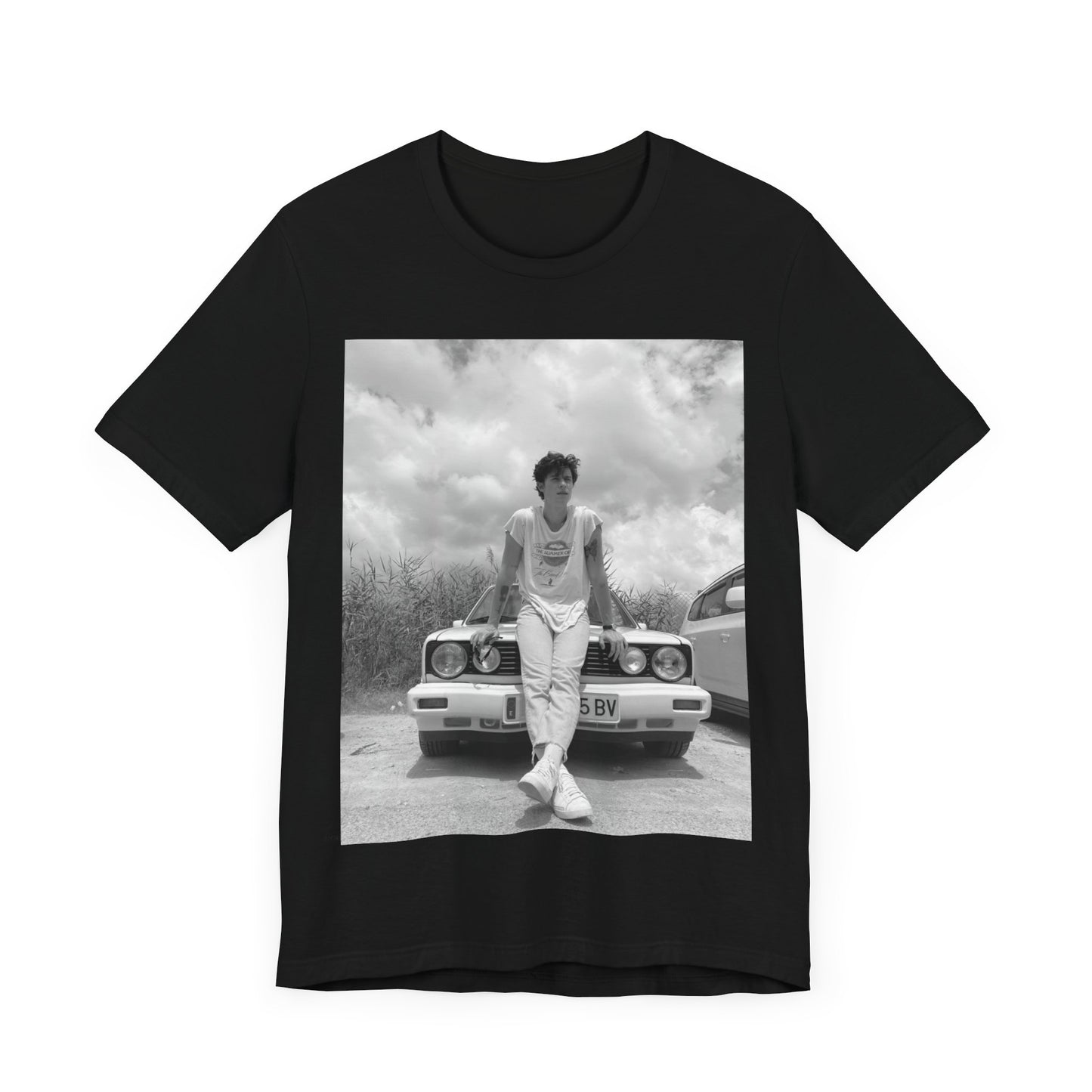 A black graphic t-shirt featuring a graphic of Shawn Mendes in an iconic tank top look.
