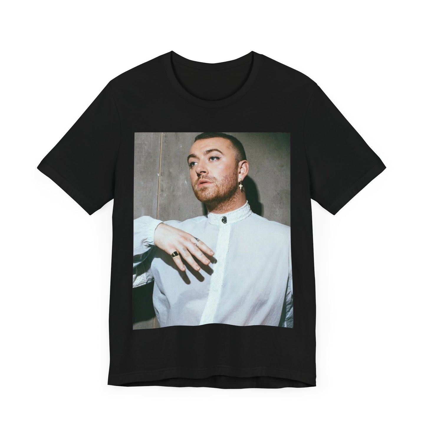 A black graphic t-shirt featuring a vintage graphic of Sam Smith emphasizing their soulful voice.