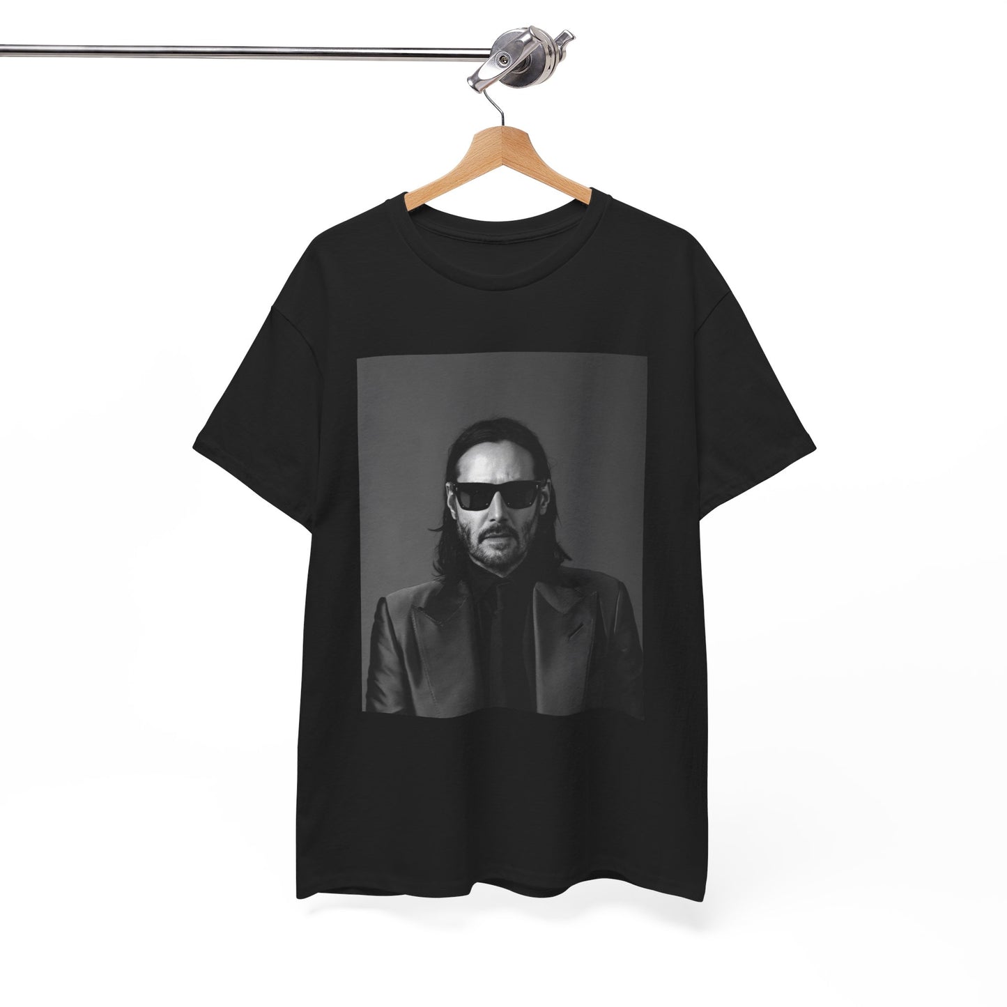 A black graphic t-shirt featuring an aesthetic graphic of Keanu Reeves as an action hero.