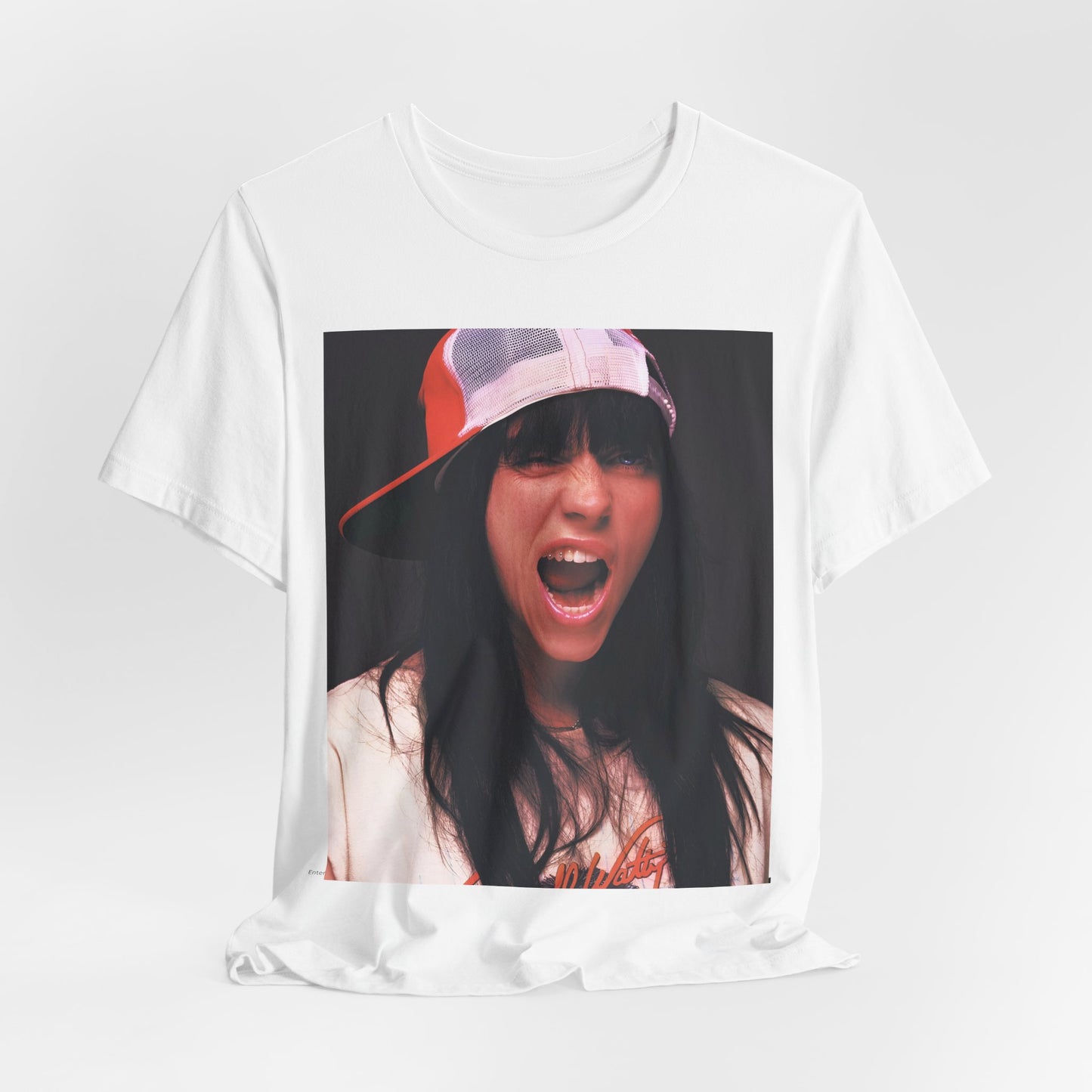 A multi-panel, graphic t-shirt inspired by the Billie Eilish song 'all the good girls go to hell,' featuring different images of her.