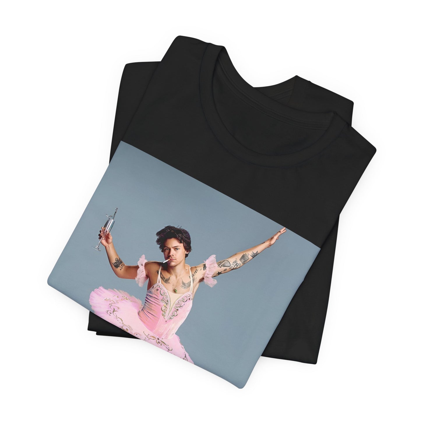A black graphic t-shirt featuring a photo of Harry Styles in a ballet pose or setting.