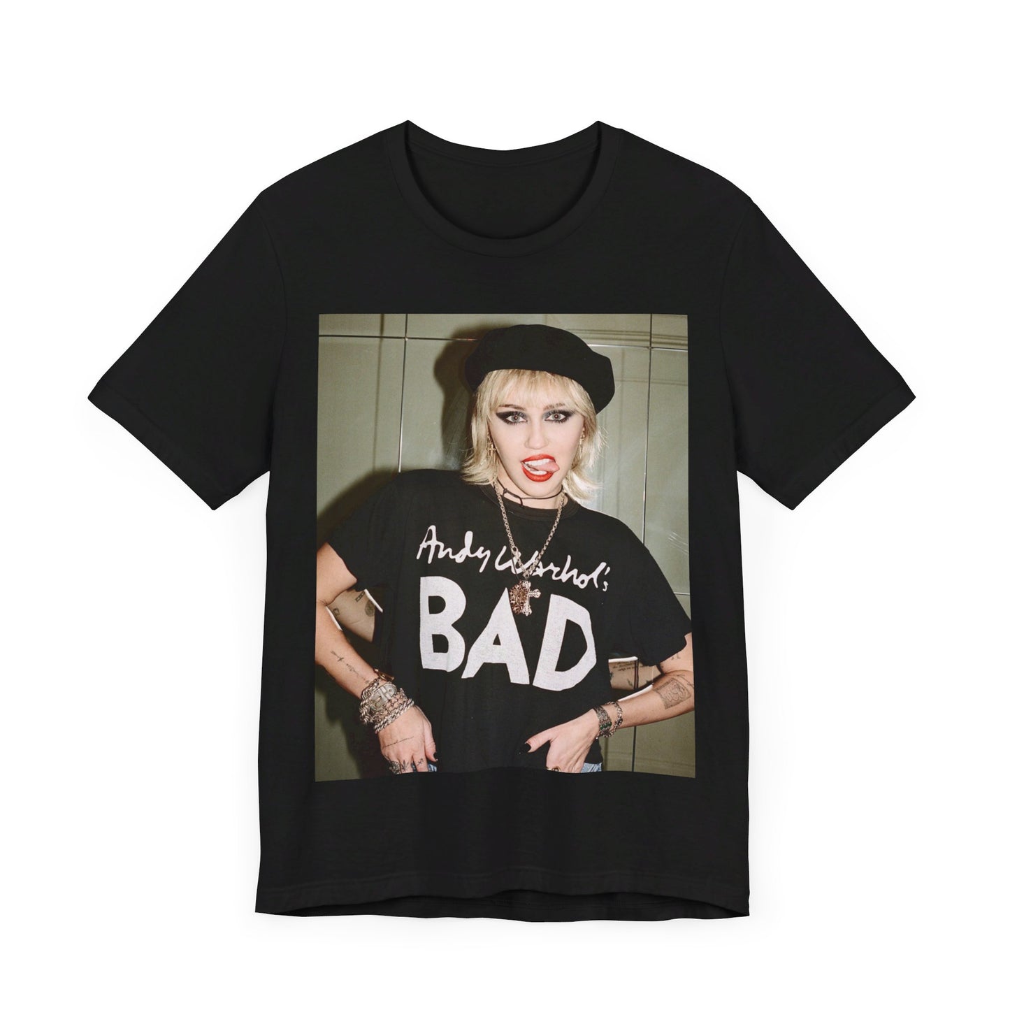 A black graphic t-shirt featuring a graphic related to Miley Cyrus' 'Bad Karma' era.