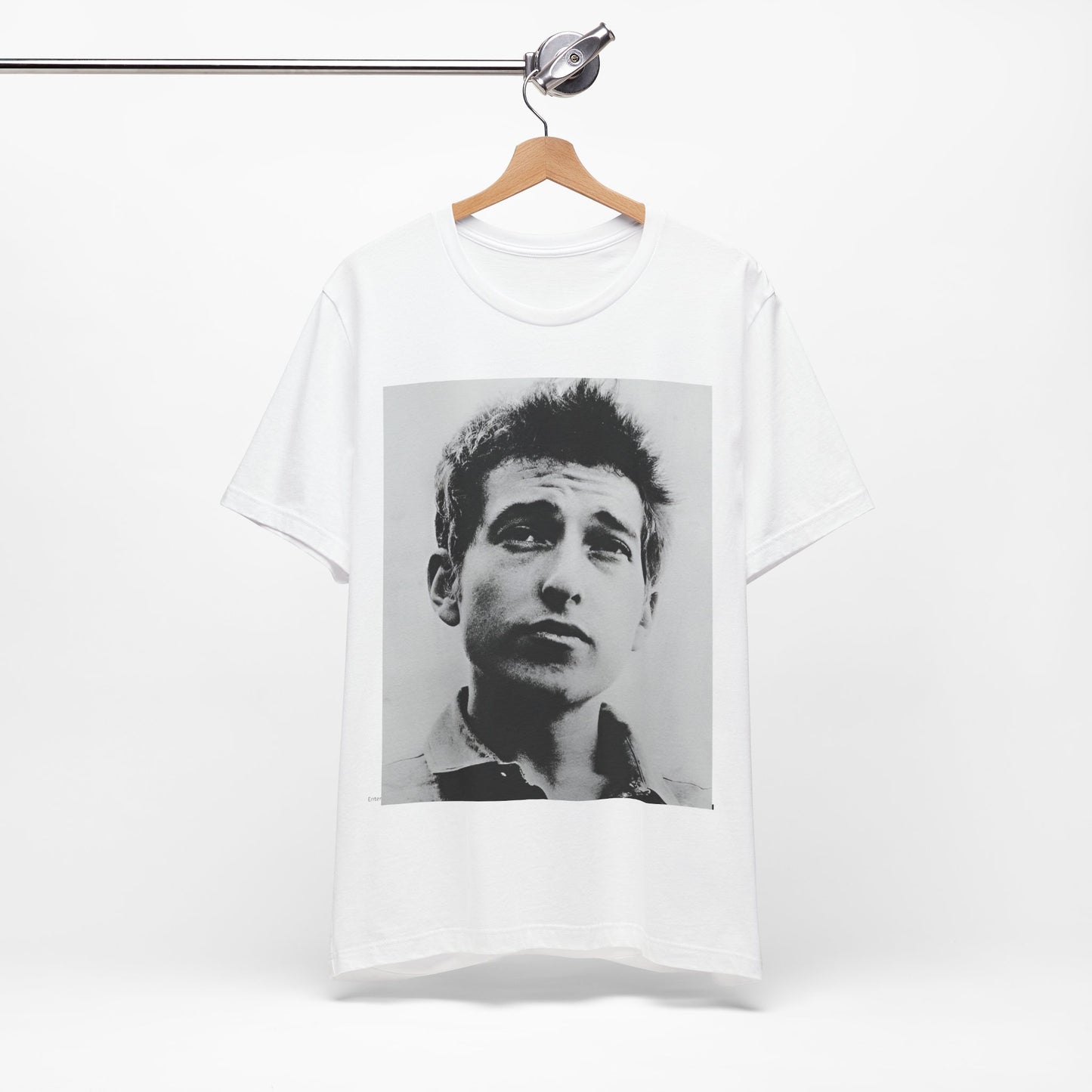 A black graphic t-shirt featuring a retro black and white folk iconic graphic of Bob Dylan.