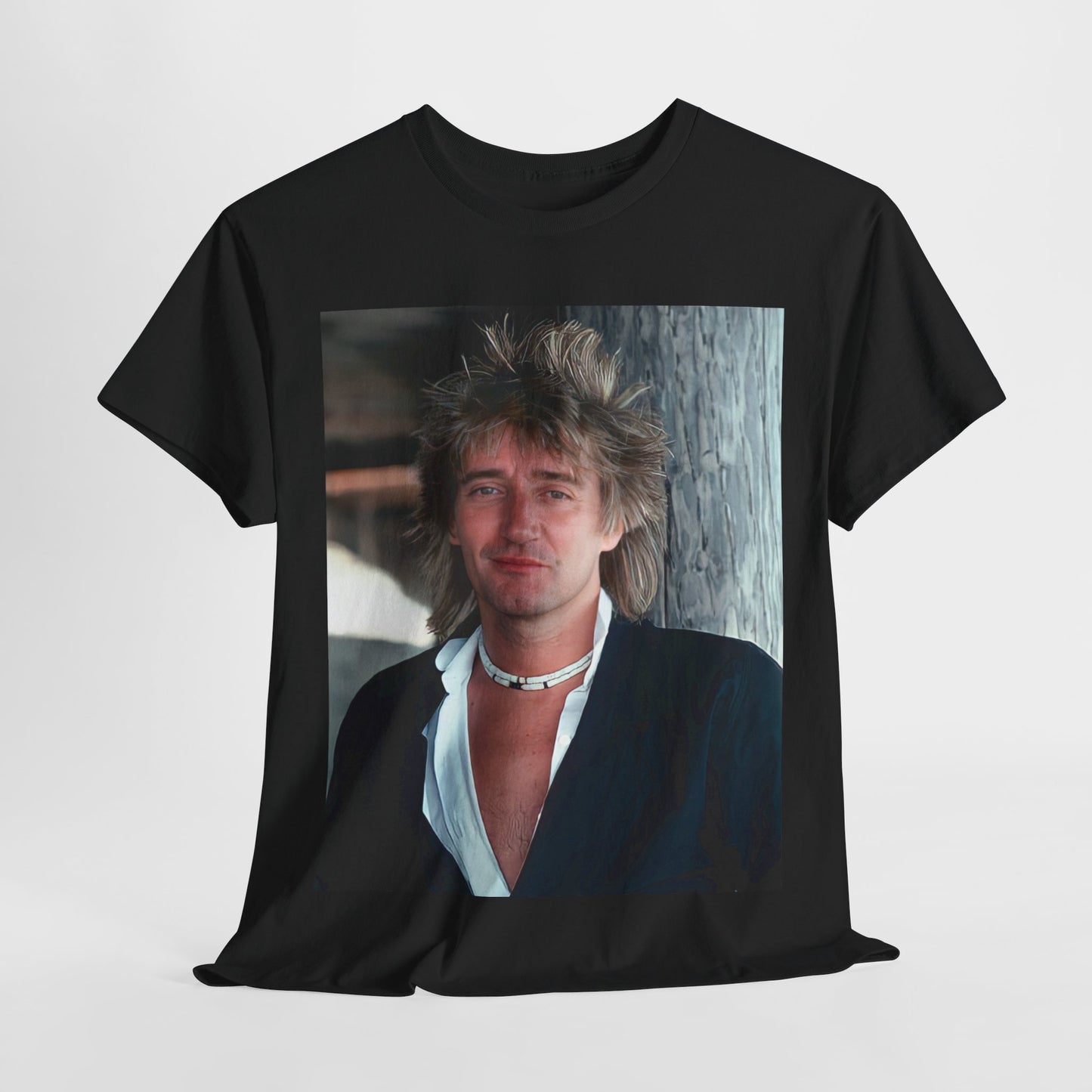 A black graphic t-shirt featuring a graphic of Rod Stewart as a cool British rocker.