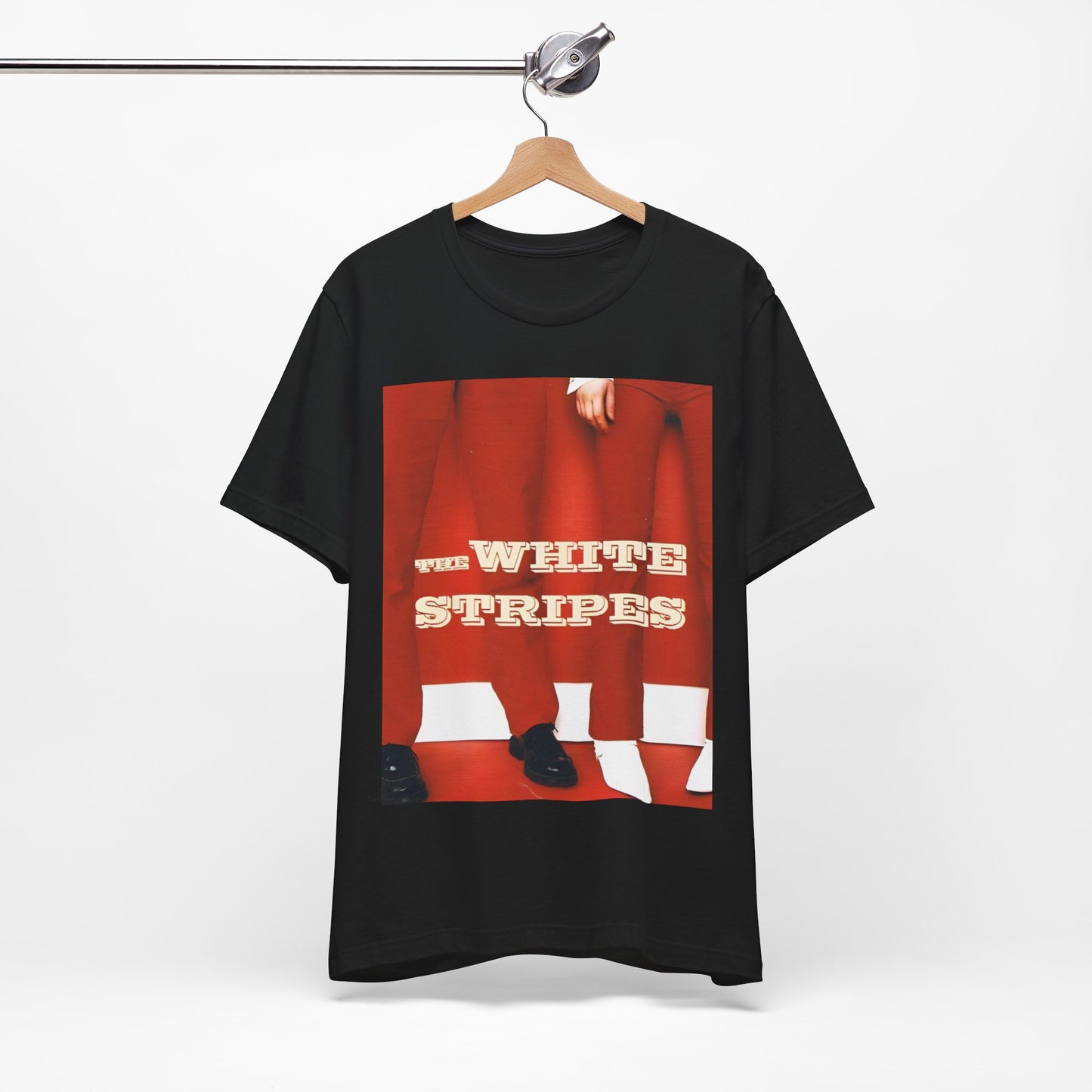 A black graphic t-shirt featuring a red and white signature graphic of The White Stripes.