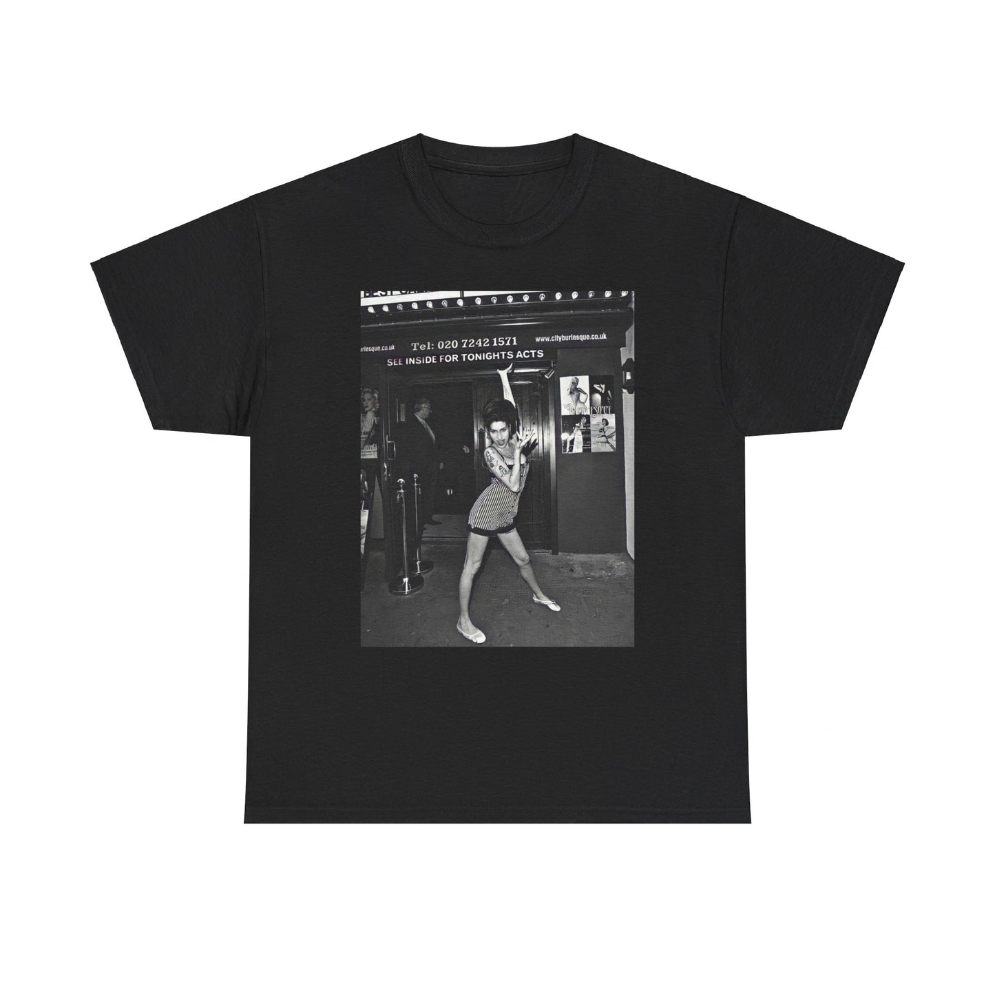 A black graphic t-shirt featuring a black and white graphic of Amy Winehouse in a burlesque club setting, stylized to evoke that ambiance.