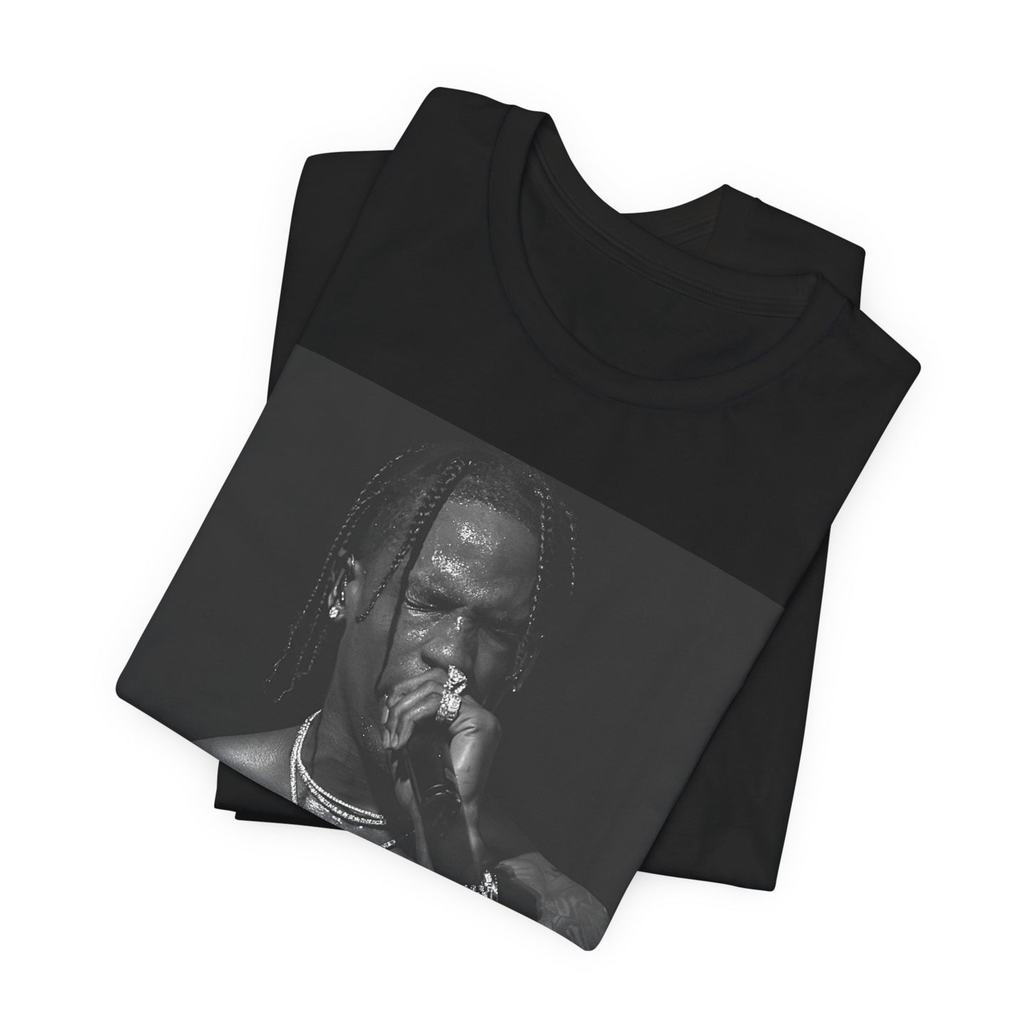 A black graphic t-shirt featuring an underground hip hop graphic of Travis Scott.
