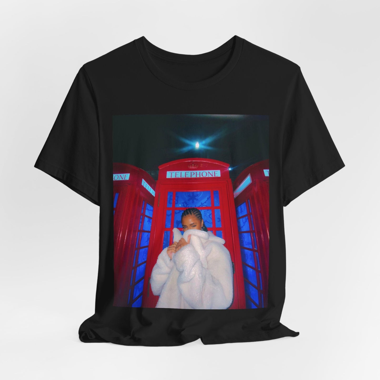 A black graphic t-shirt featuring a rhythmic dance pop graphic of Tyla.