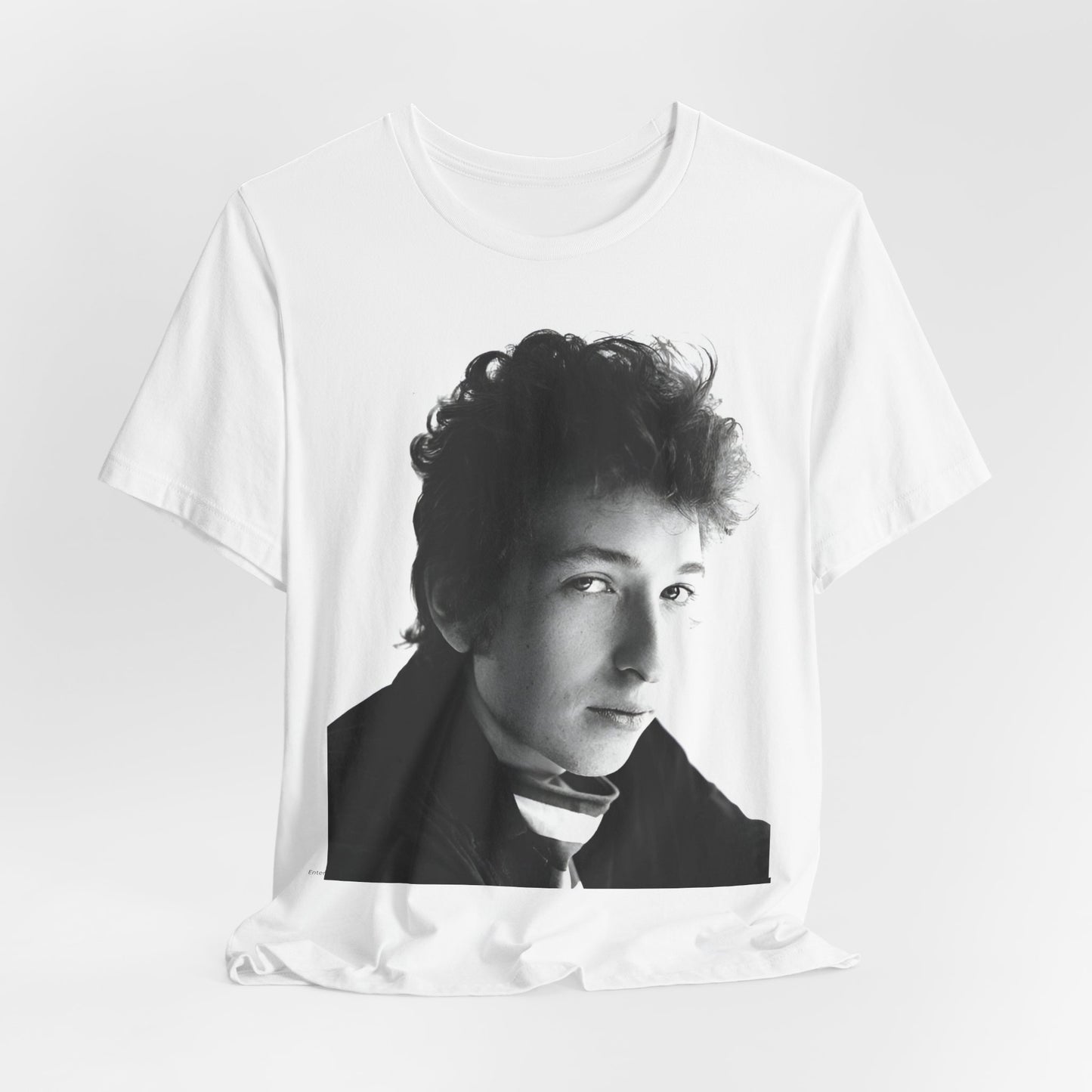 A black graphic t-shirt featuring a graphic related to Bob Dylan's 'Like a Rolling Stone' song or era.