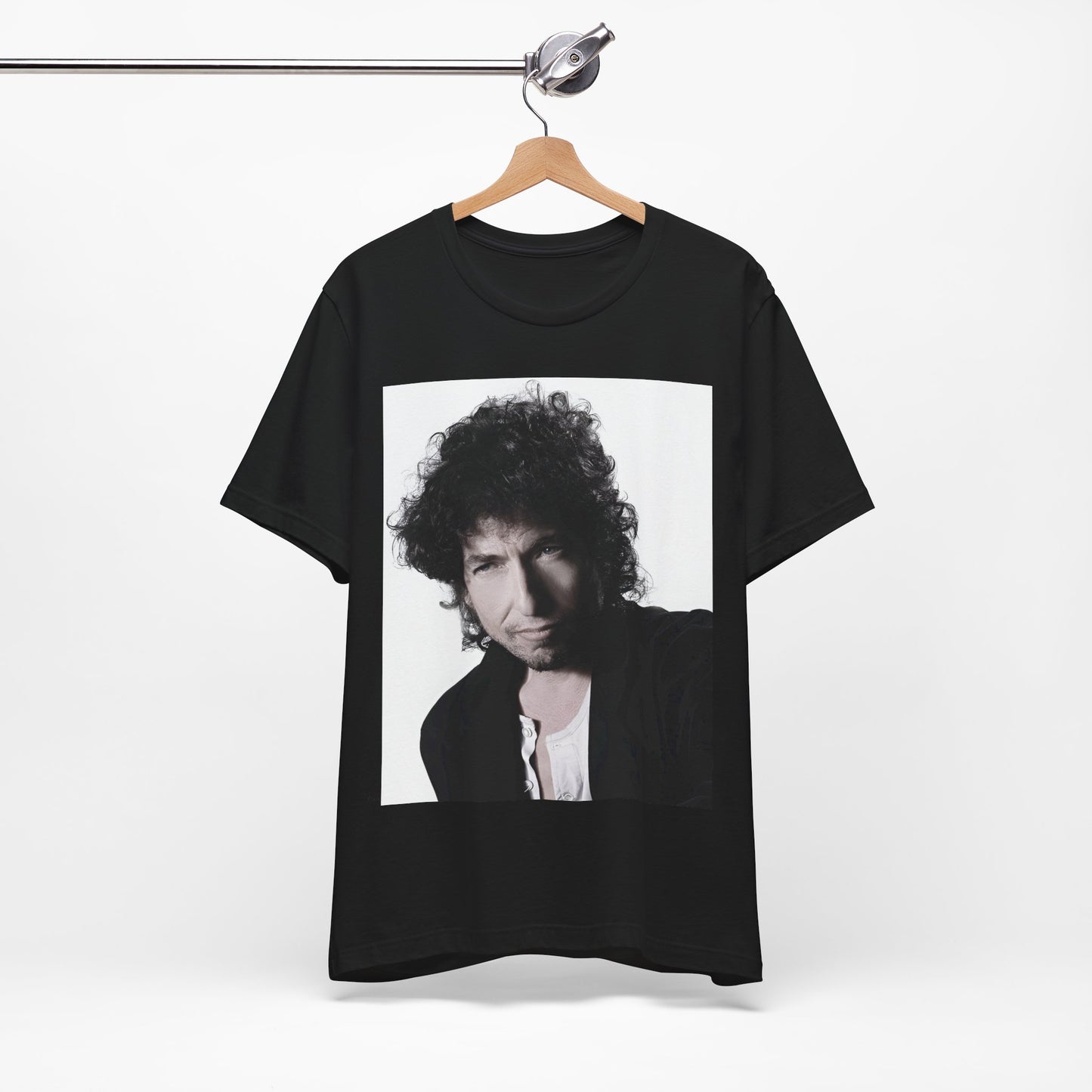 A black graphic t-shirt featuring a timeless folk rock graphic of Bob Dylan, possibly with his guitar or harmonica.