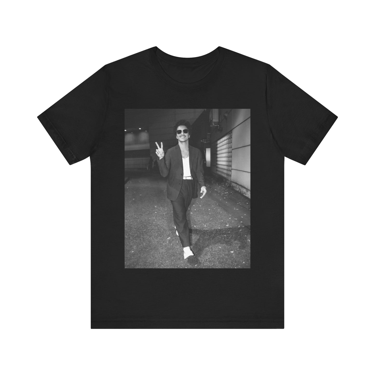 A black graphic t-shirt featuring a black and white graphic or photo of Bruno Mars in a backstage setting.
